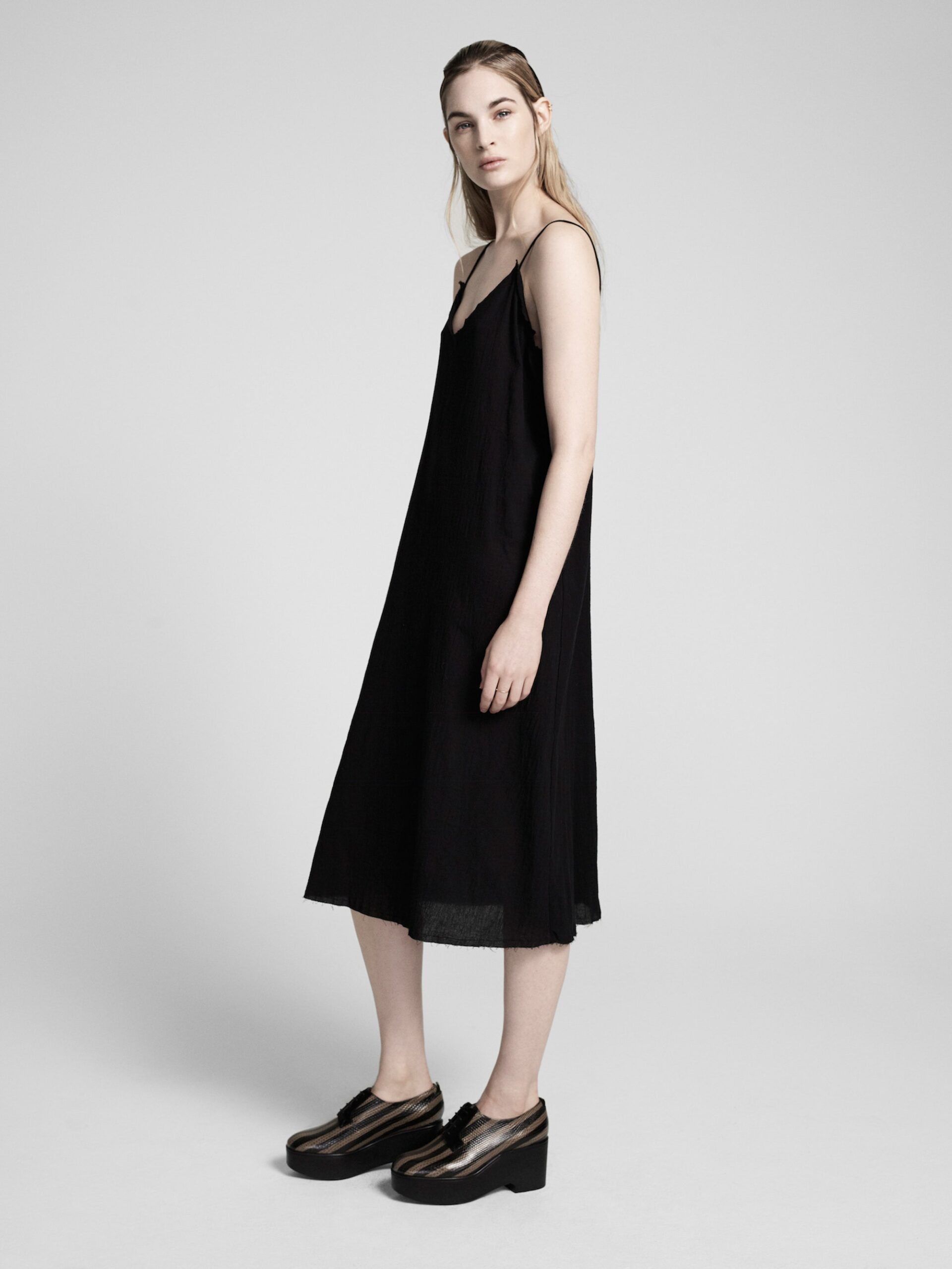 black silk midi dress with platform shoes