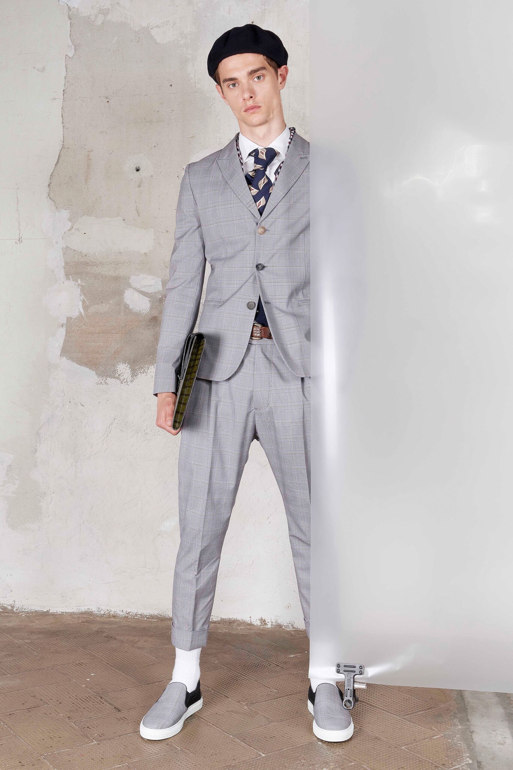 gray tailored suit with black shoes