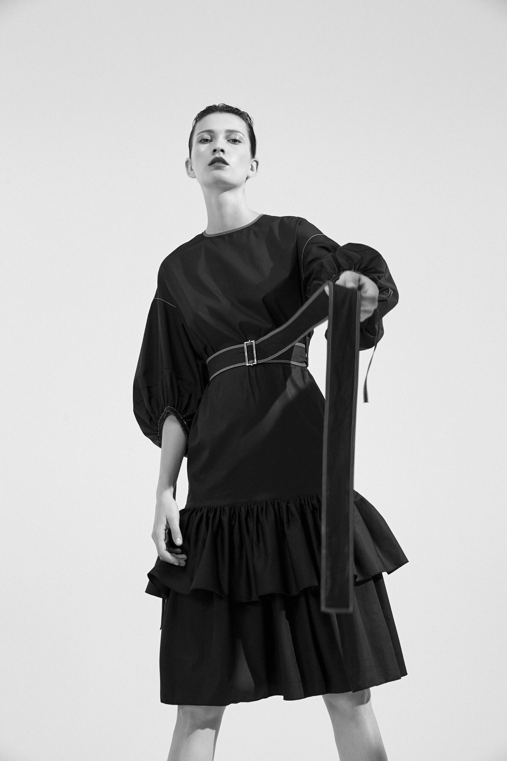 black fitted ruffled dress