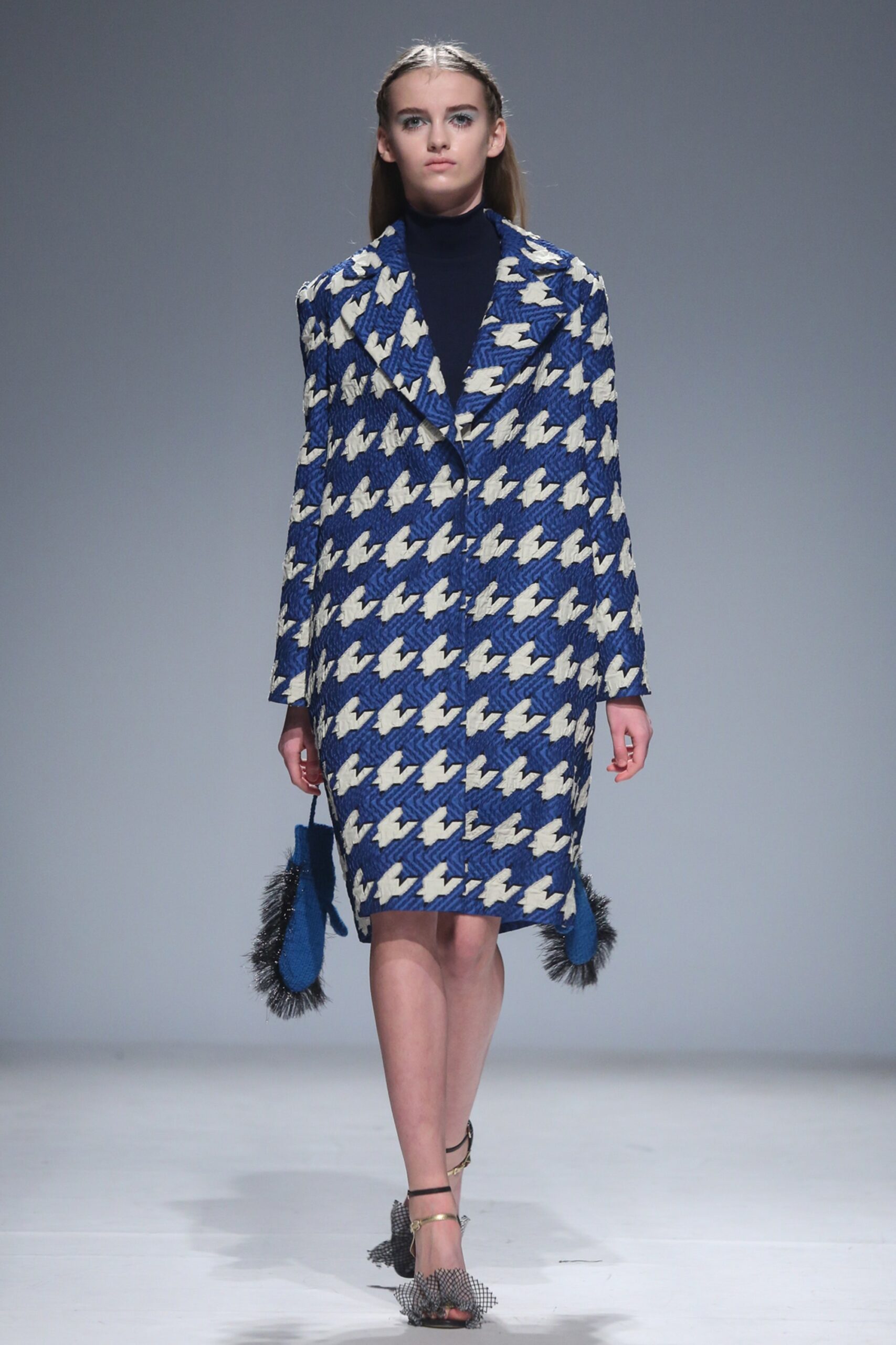 blue and white printed coat