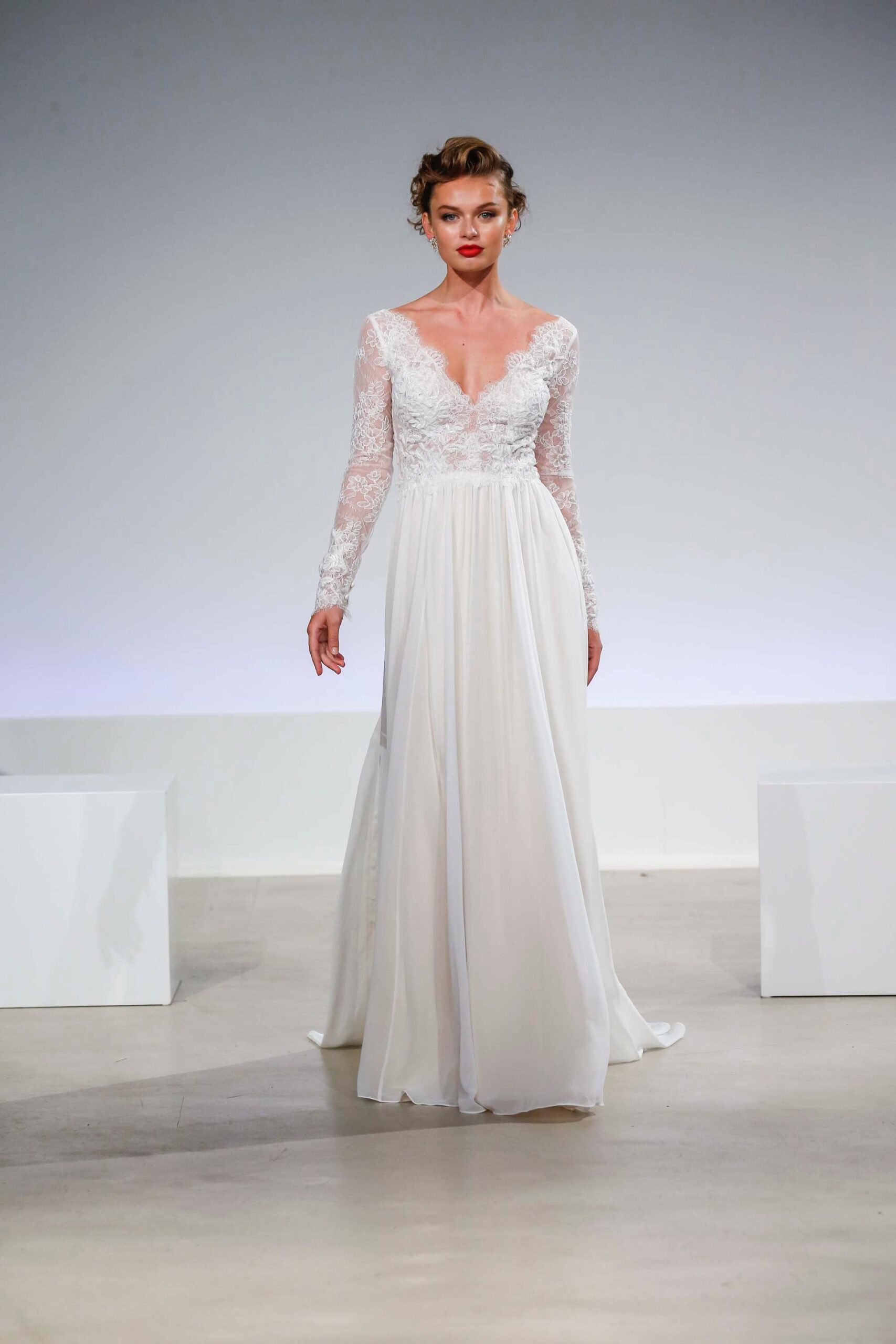 white lace long-sleeve gown