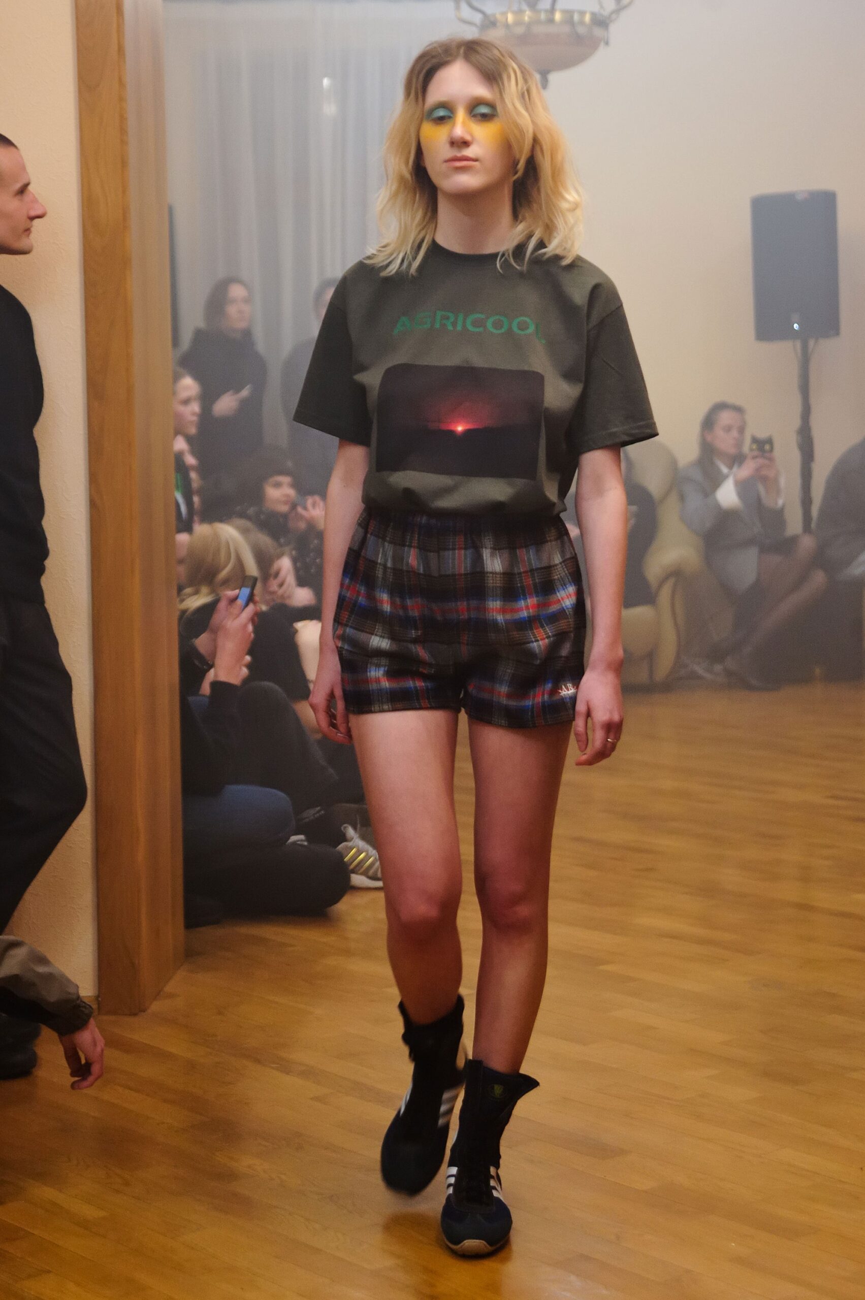 green printed t-shirt with plaid shorts