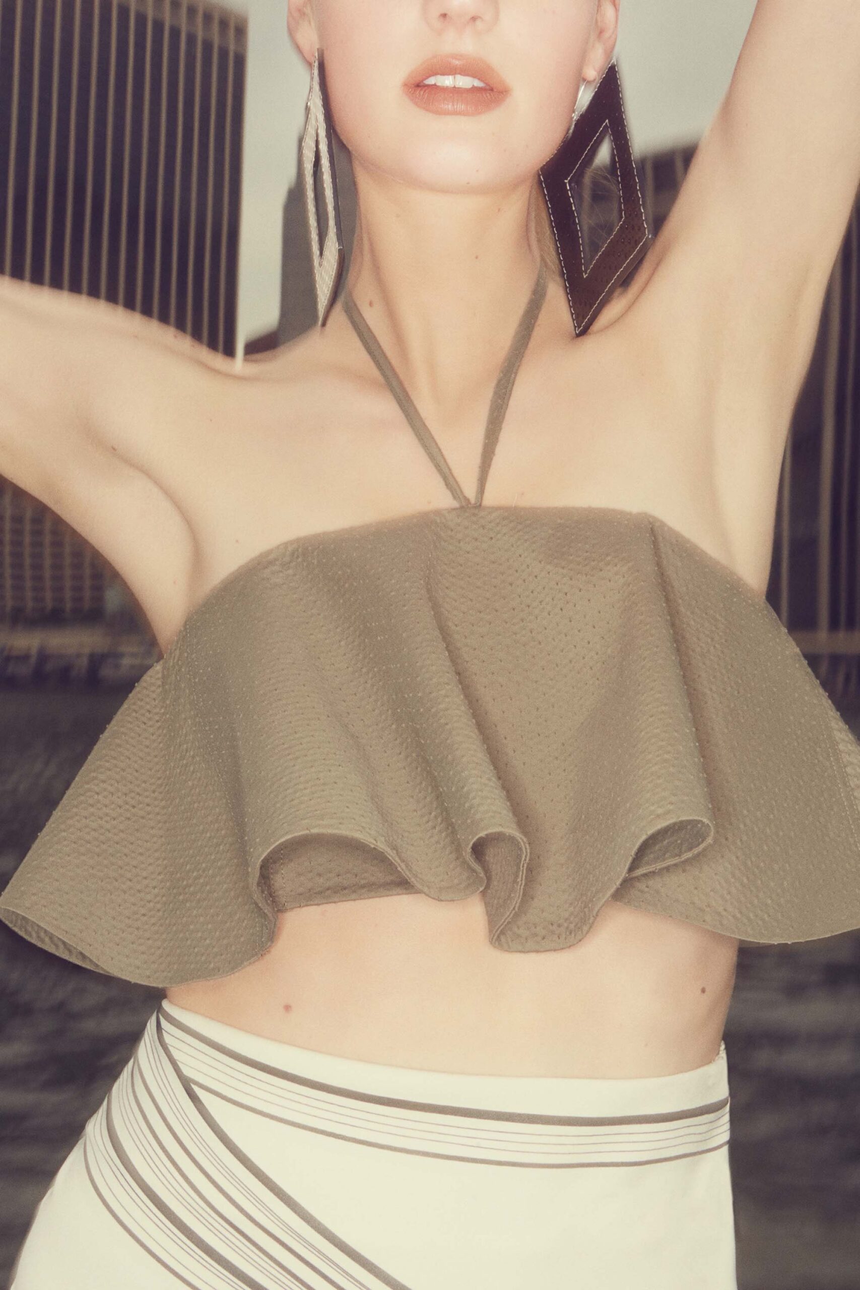 beige cotton sleeveless halter fitted ruffled cropped top