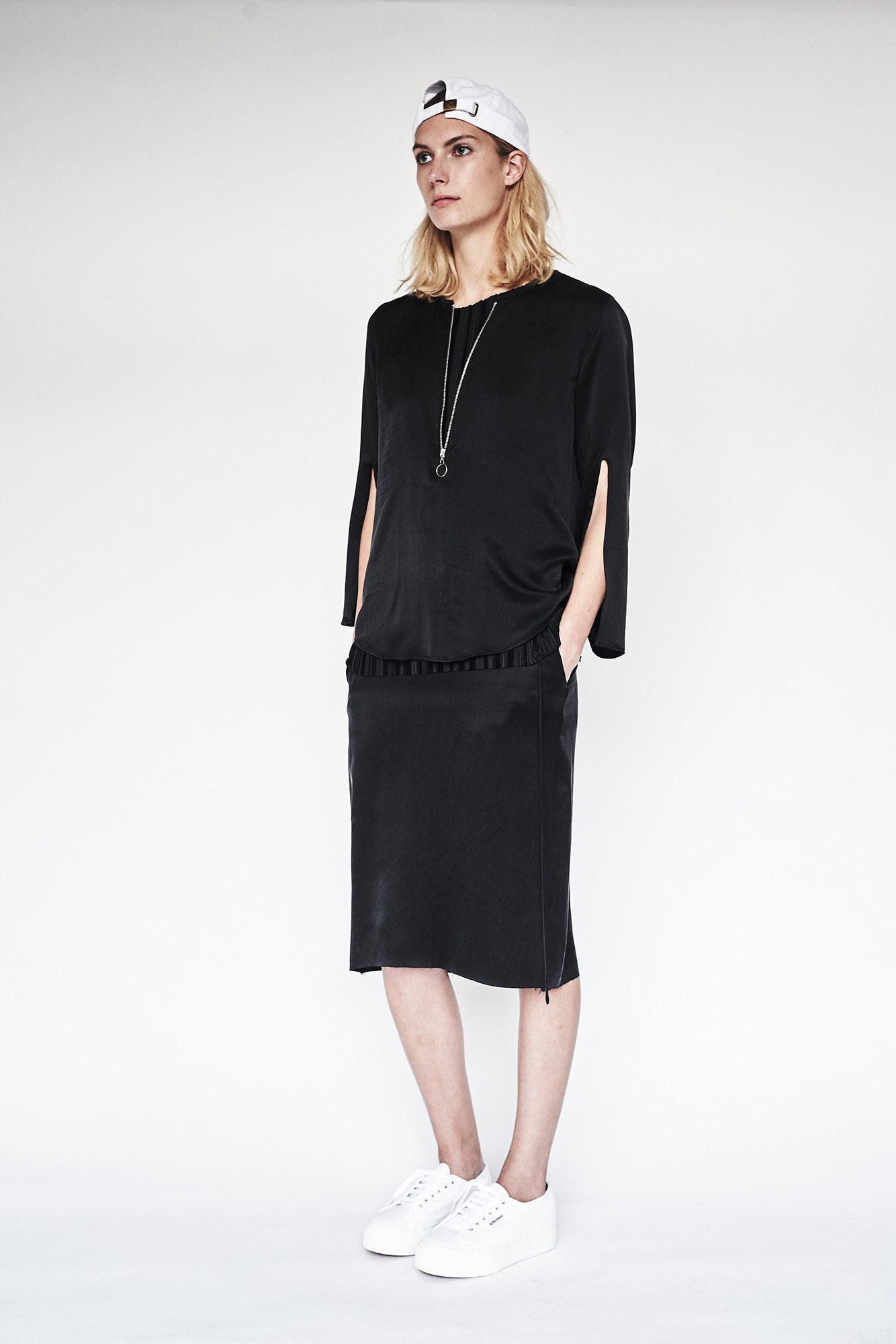 black silk top and midi skirt