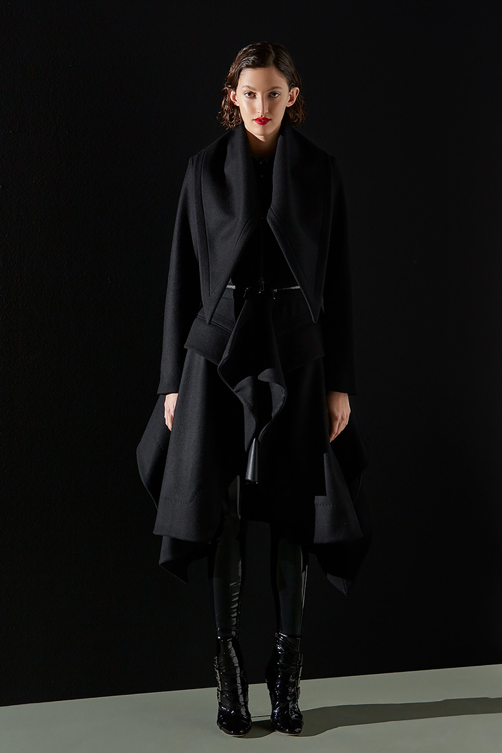 black wool long-sleeve collared fitted draped coat