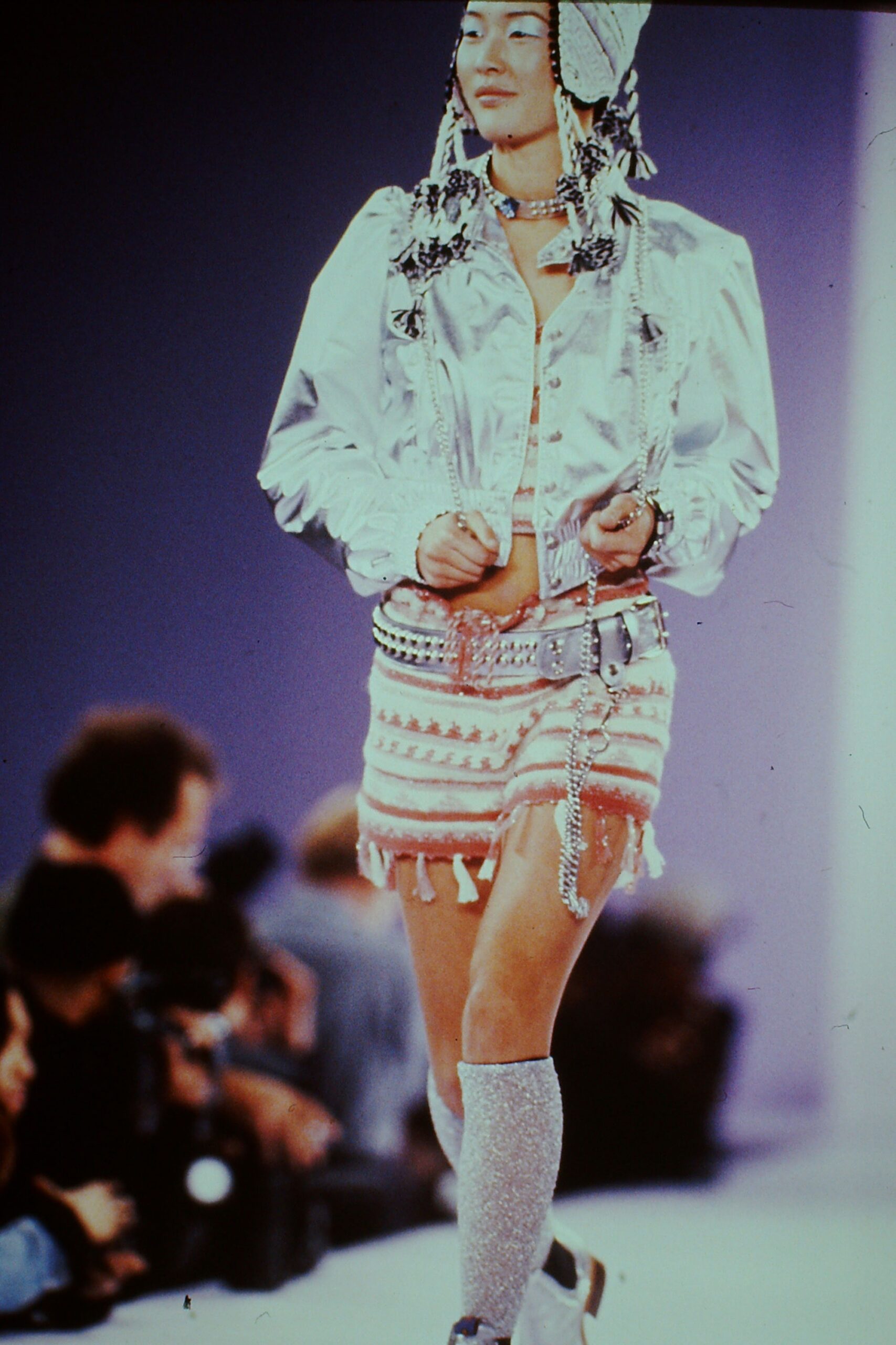 silver fitted jacket and pink mini skirt