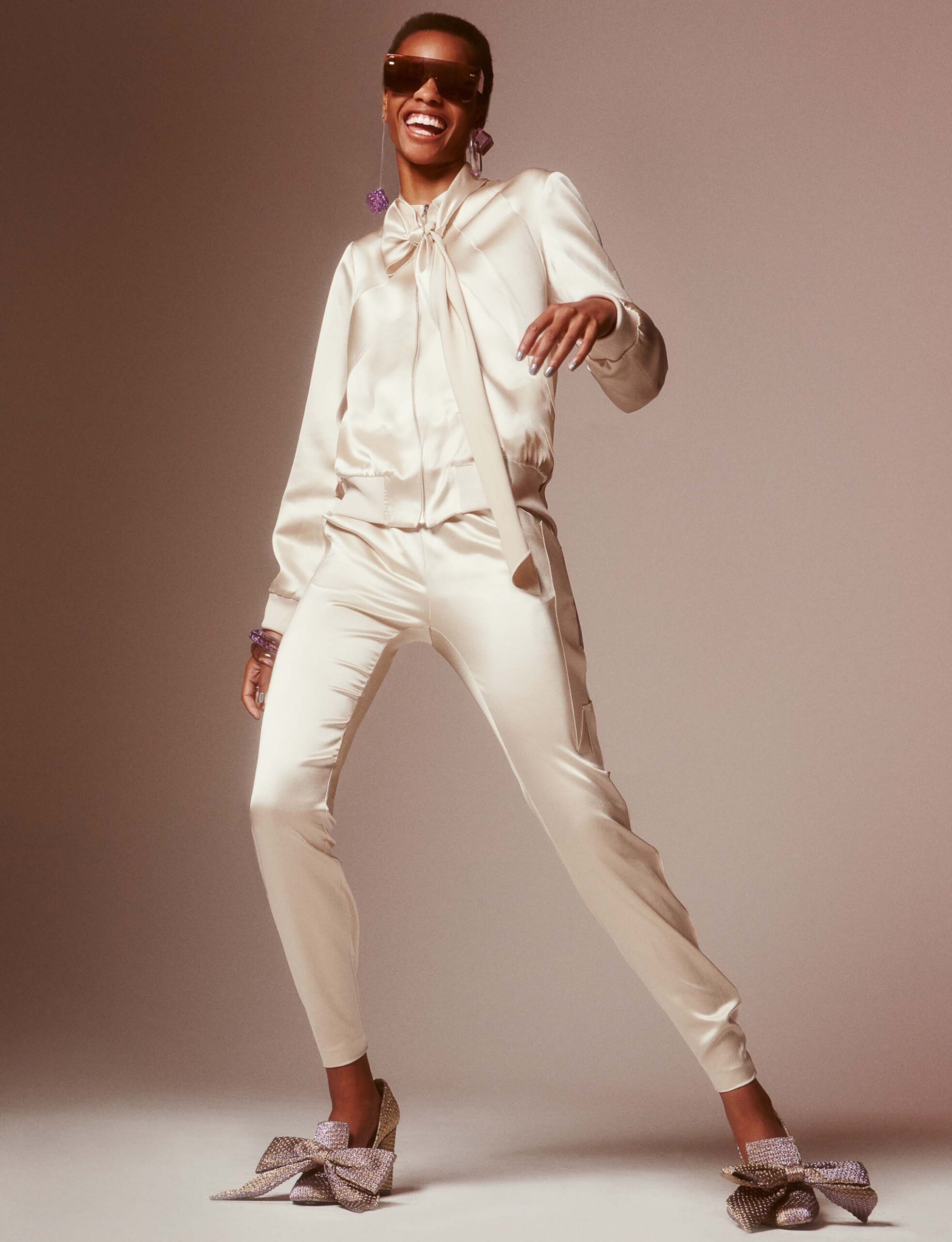 white silk fitted jacket and pants
