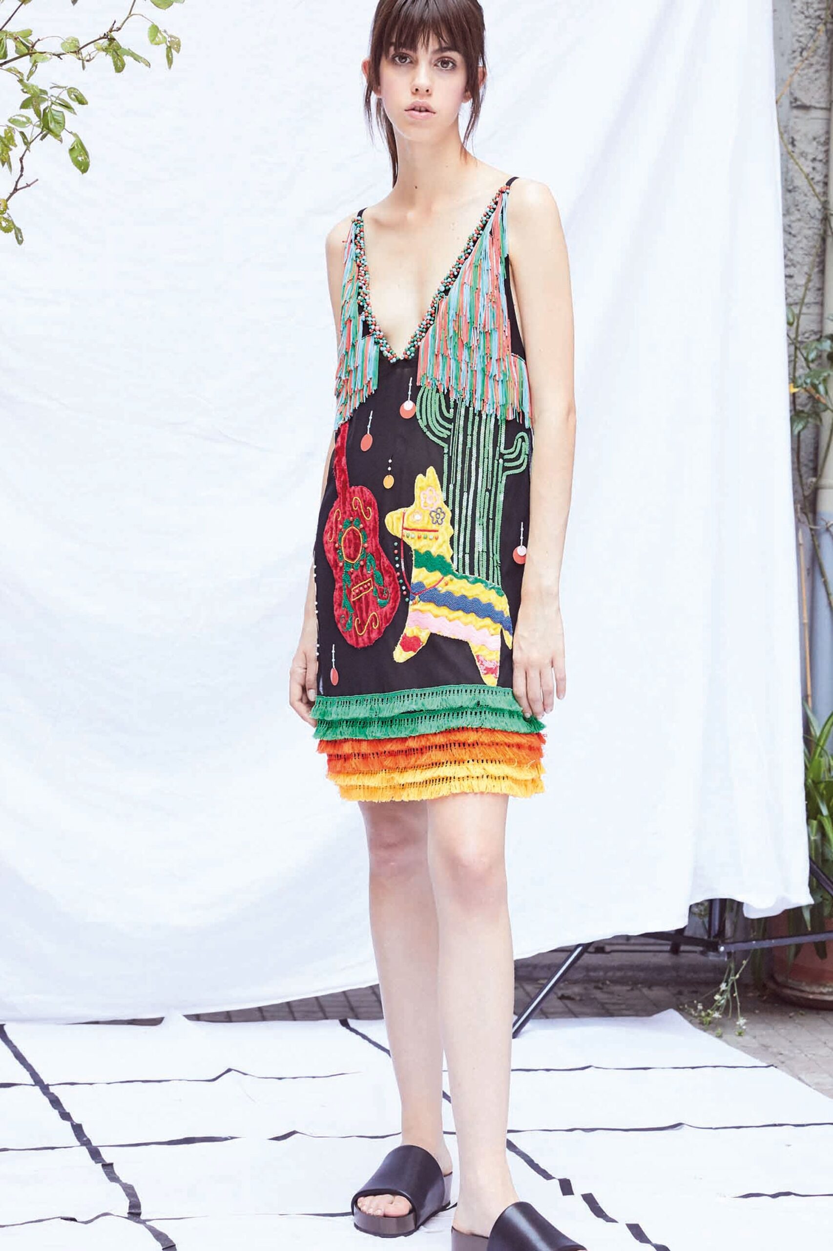 black embroidered sleeveless dress