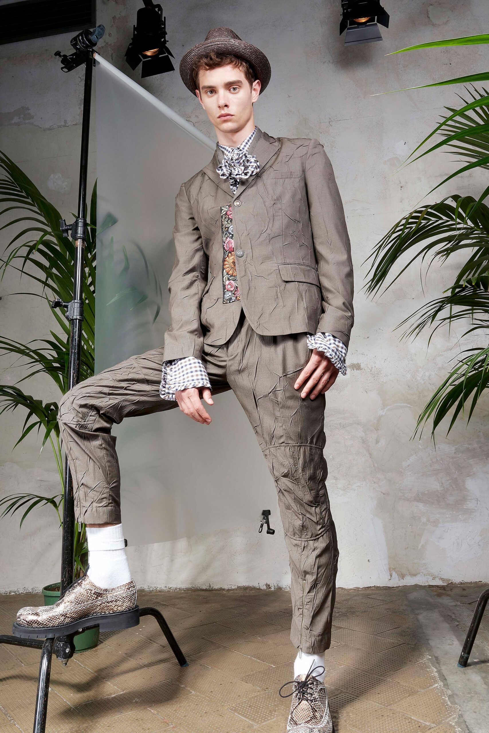 brown tailored suit with checked shirt