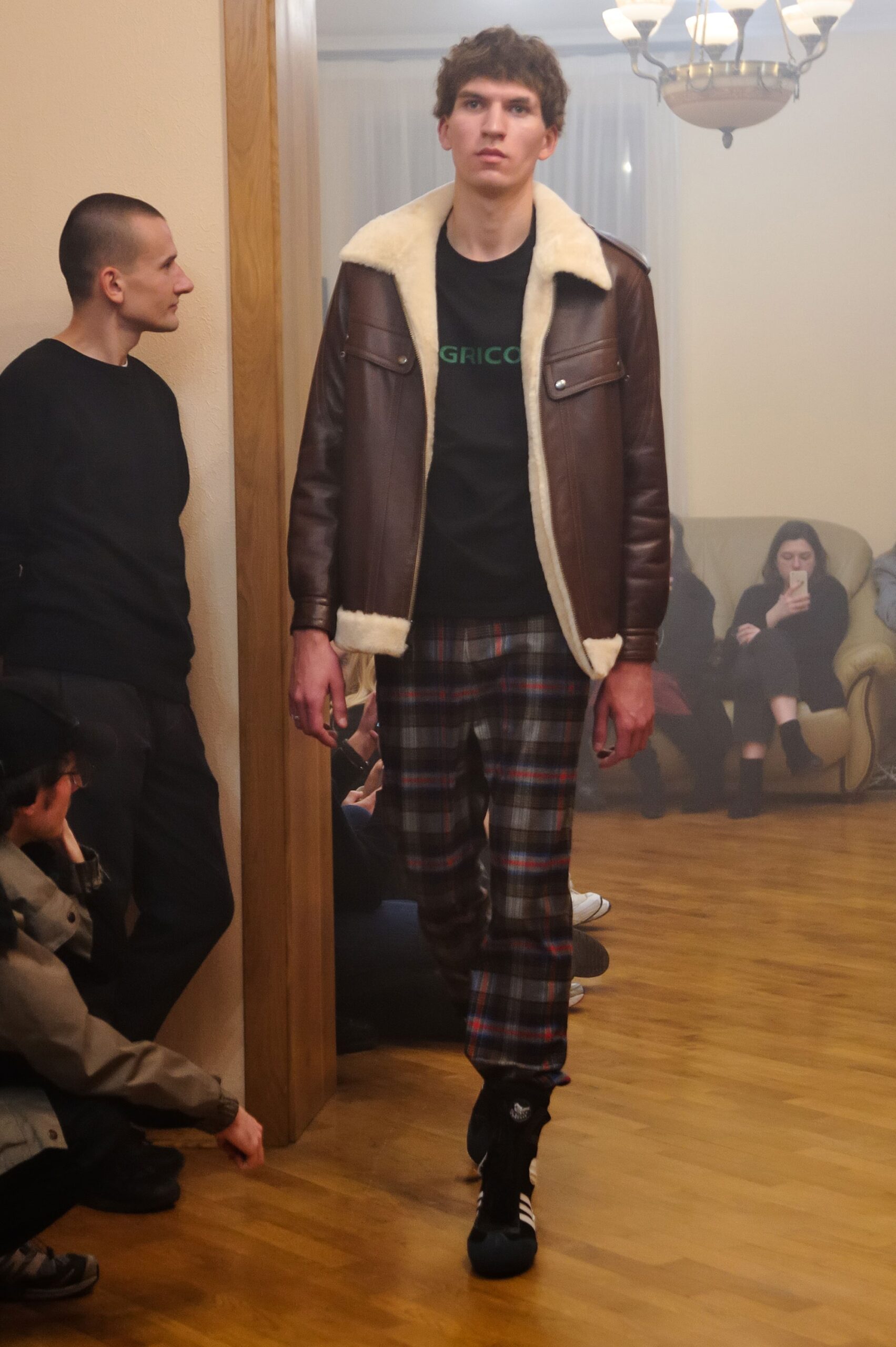 brown leather jacket with black t-shirt
