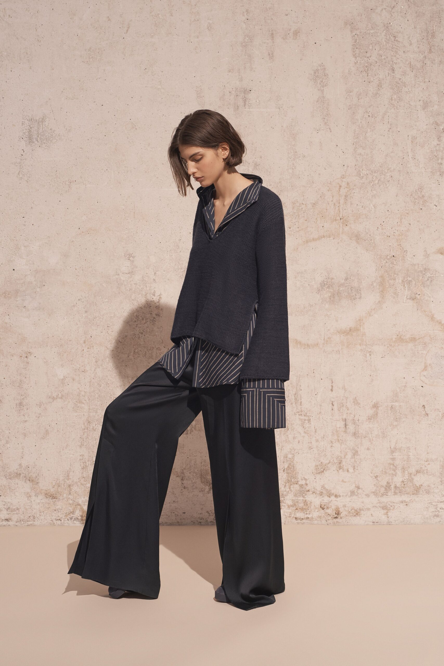 navy relaxed top with black wide-leg pants