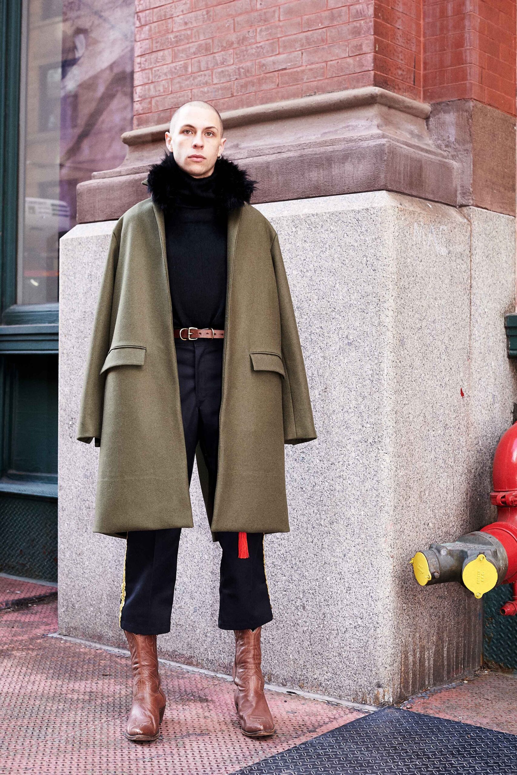 green wool coat with black top