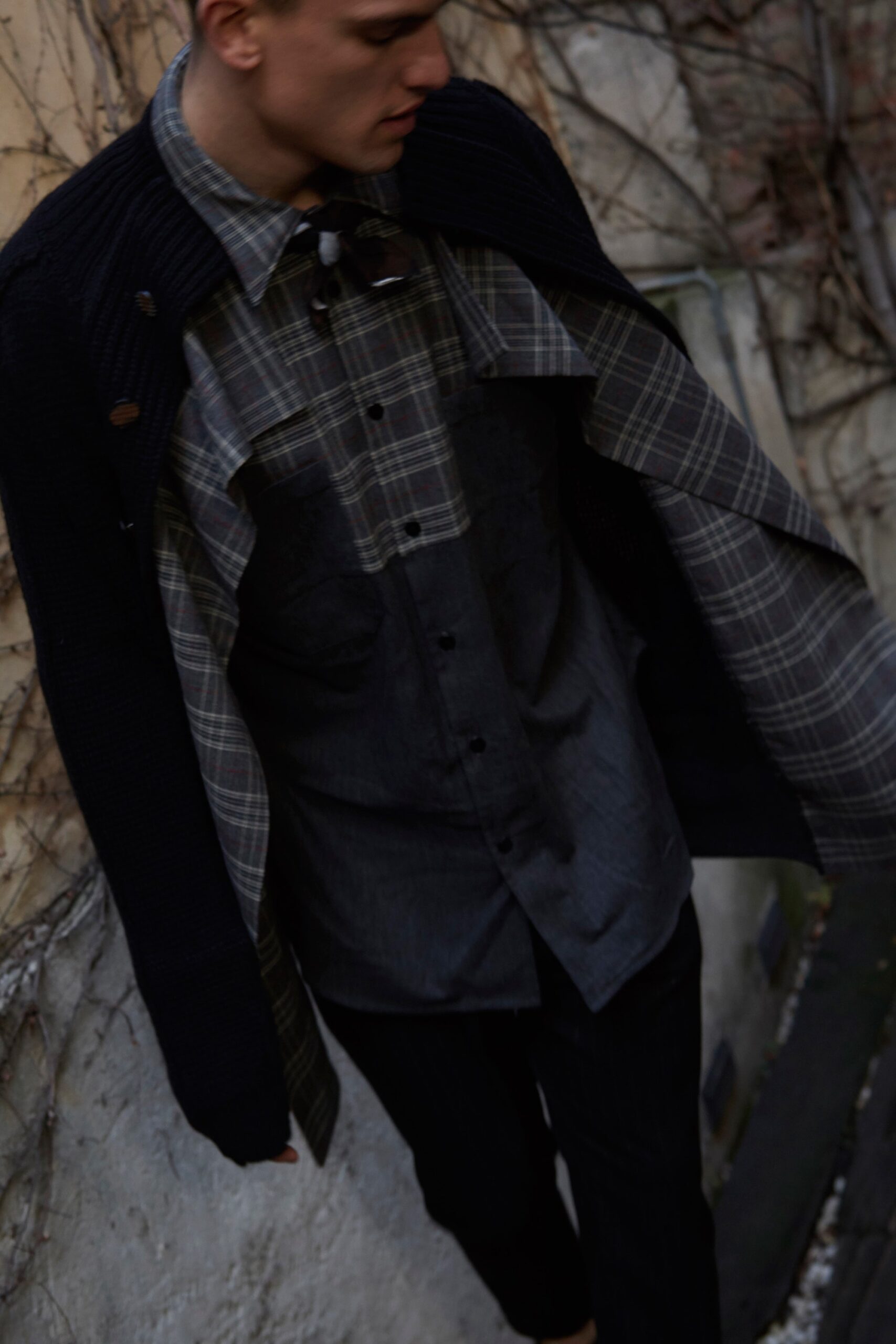 black wool long-sleeve collared oversized buttoned jacket