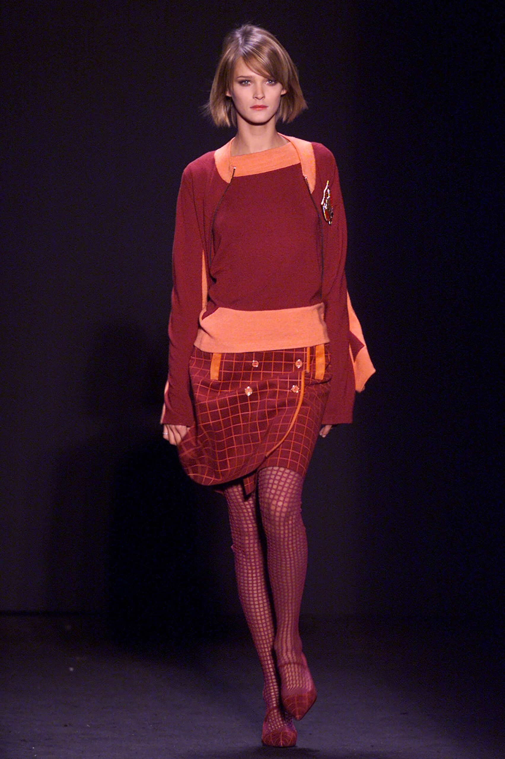 red fitted top and asymmetric skirt