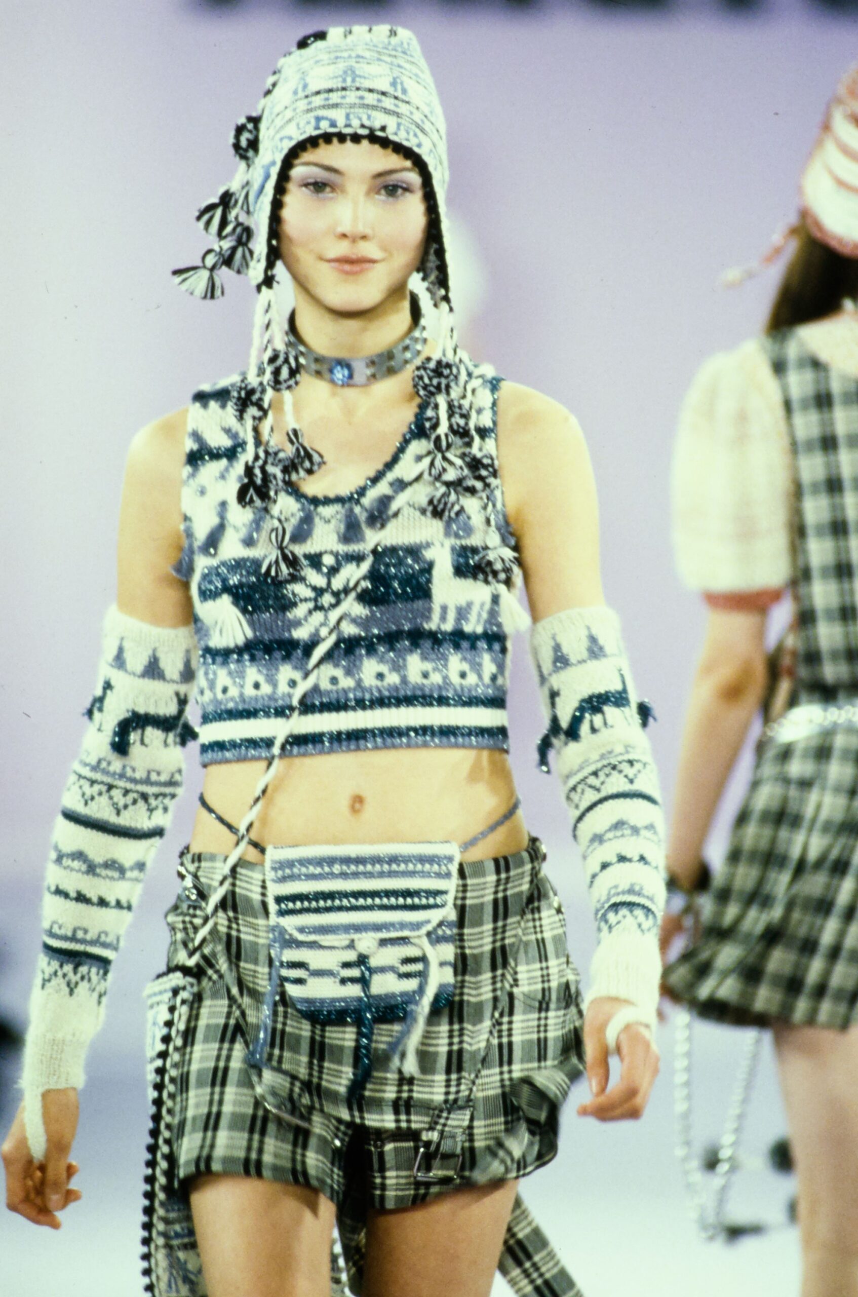 blue and white printed top with plaid shorts