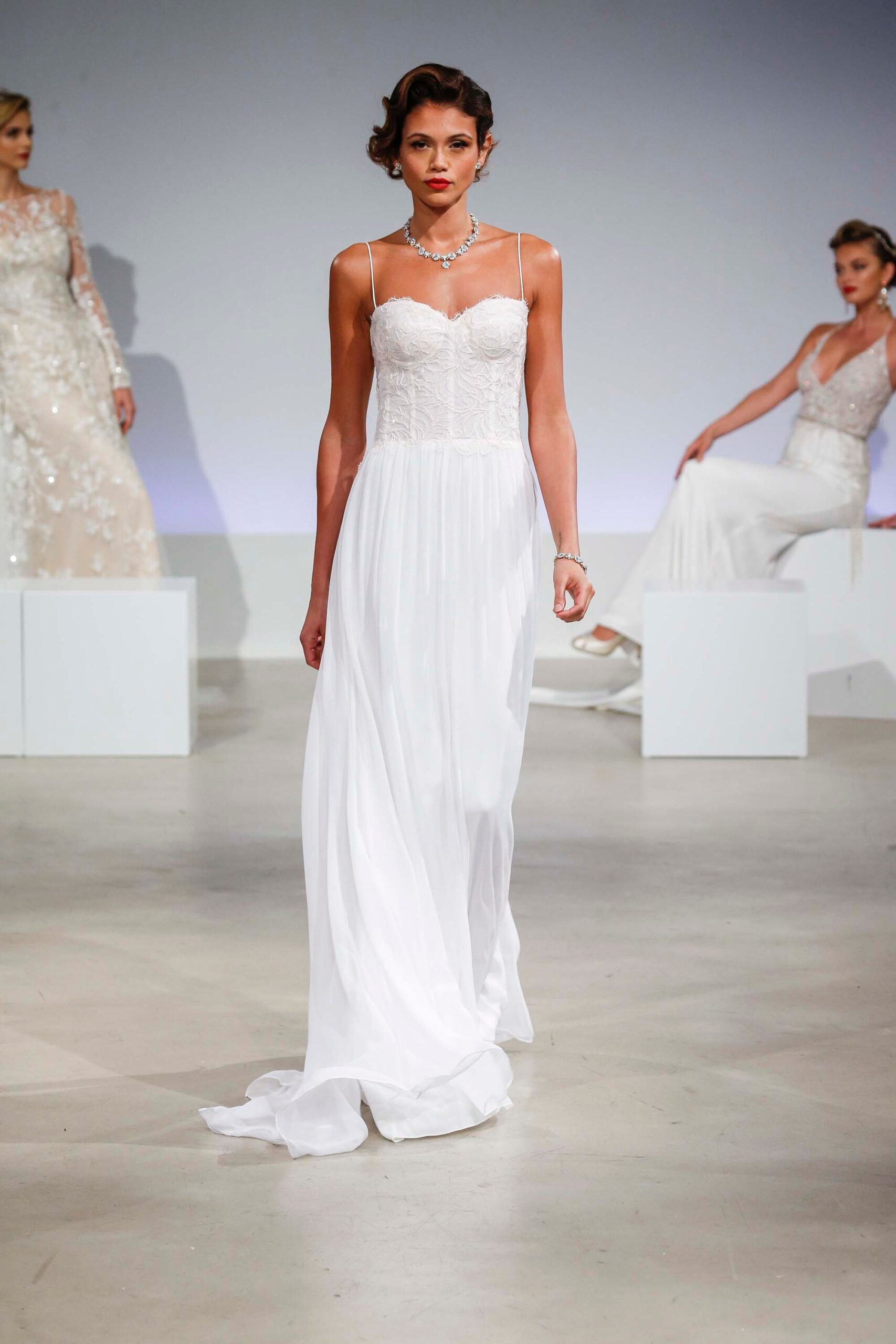 white silk sleeveless gown