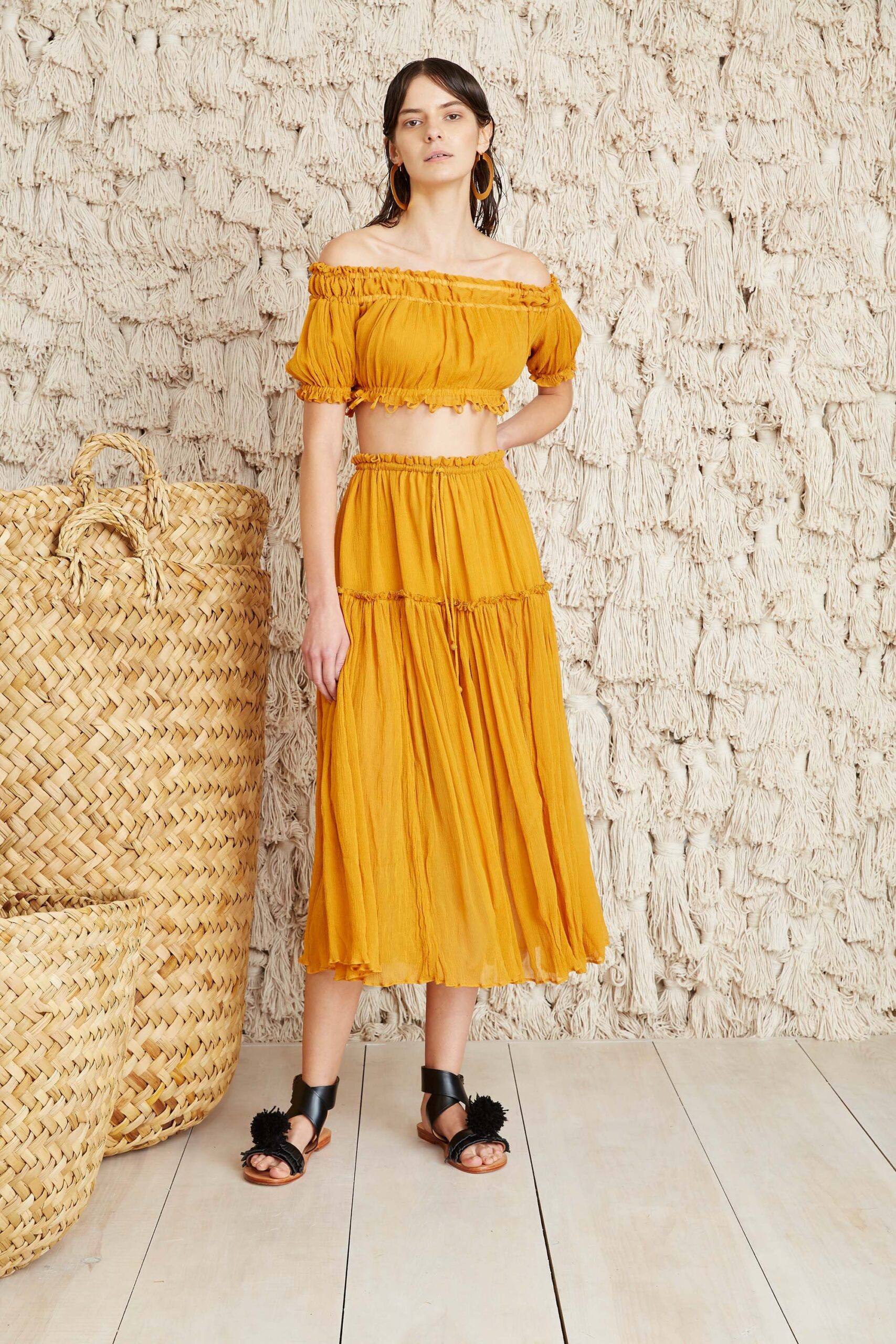 yellow off-shoulder top and tiered skirt