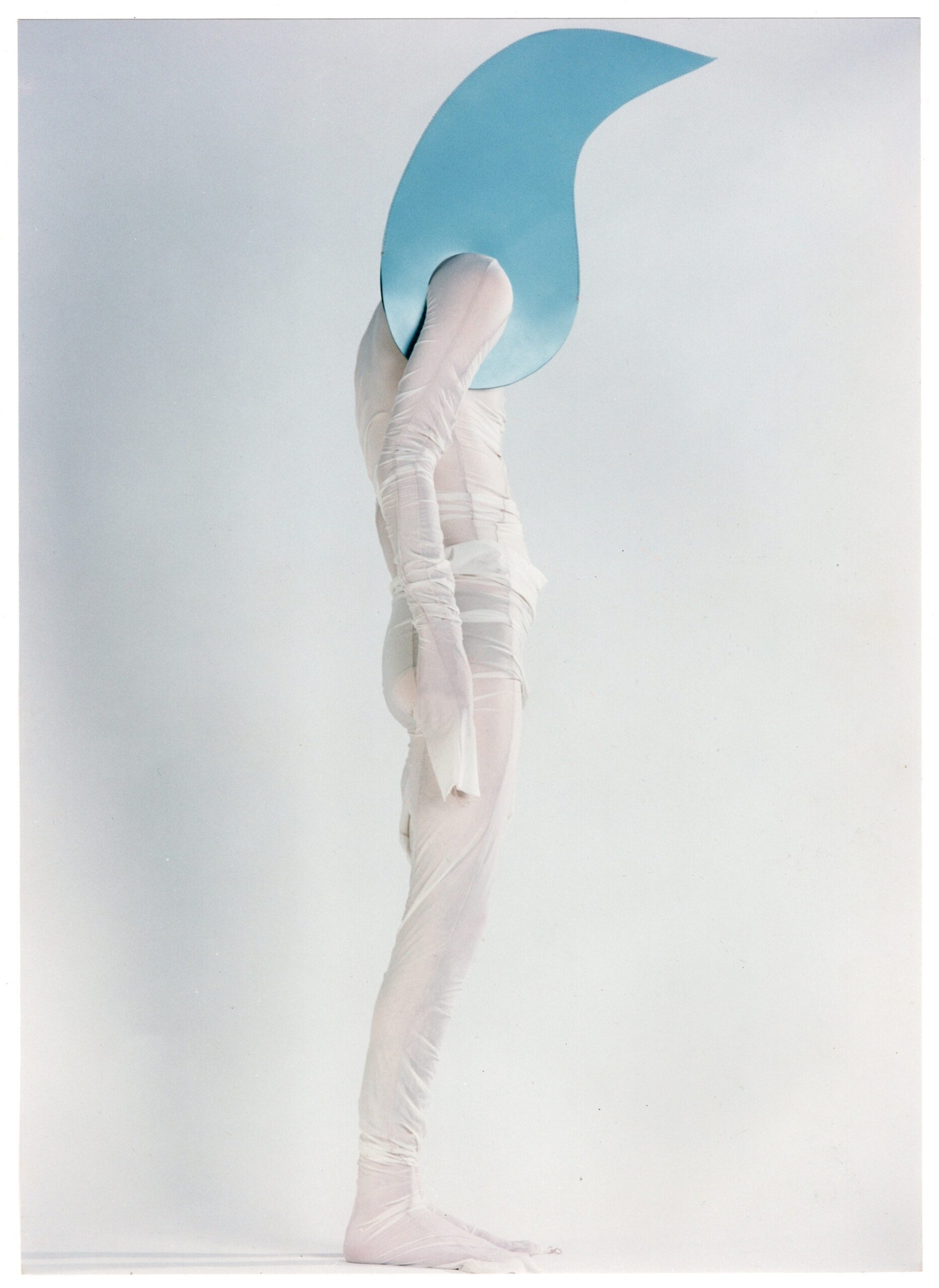 white fitted bodysuit with blue hat