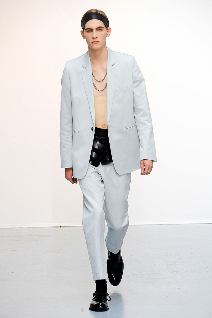 gray tailored suit with black belt