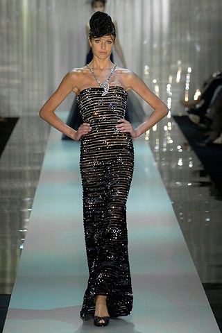 black sequin sleeveless gown