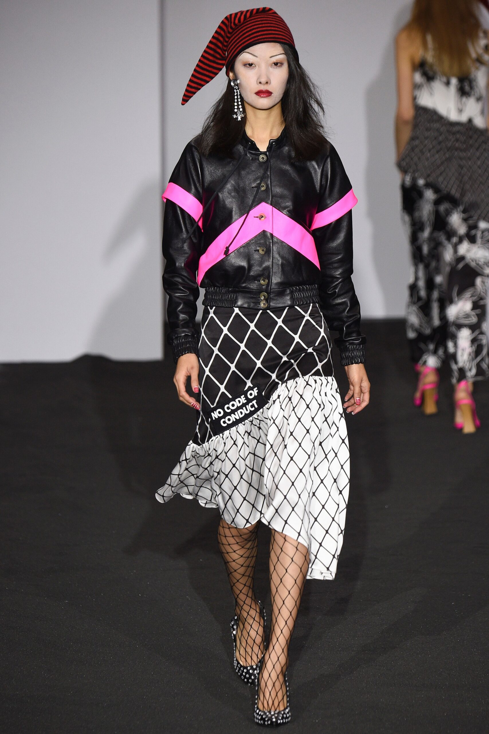 black leather jacket with pink accents