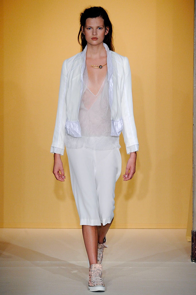 white fitted jacket with sheer top