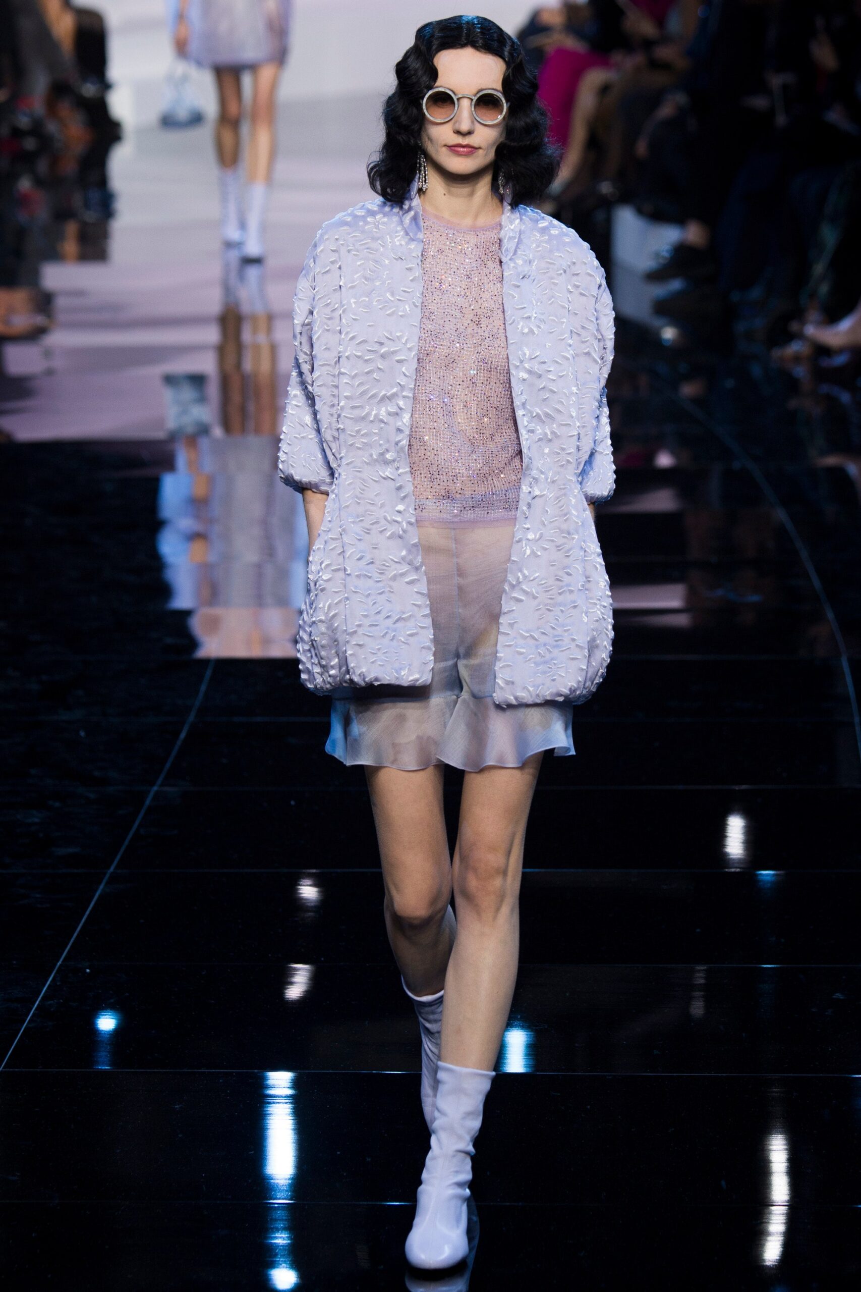 light blue layered jacket and mini skirt