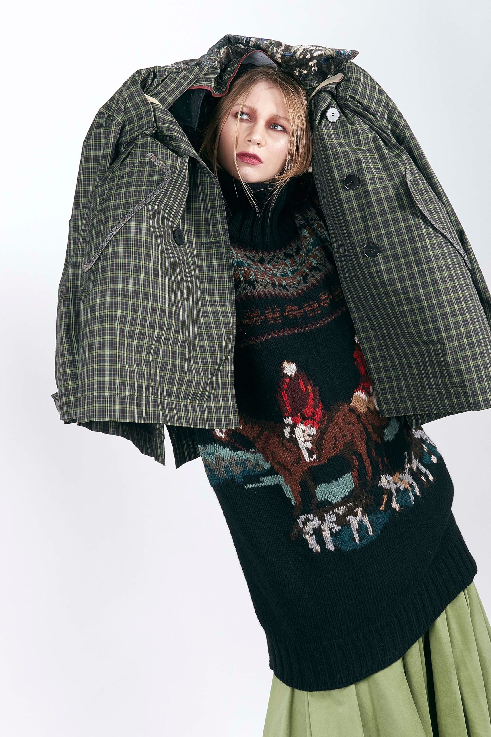 black wool sweater with embroidered design