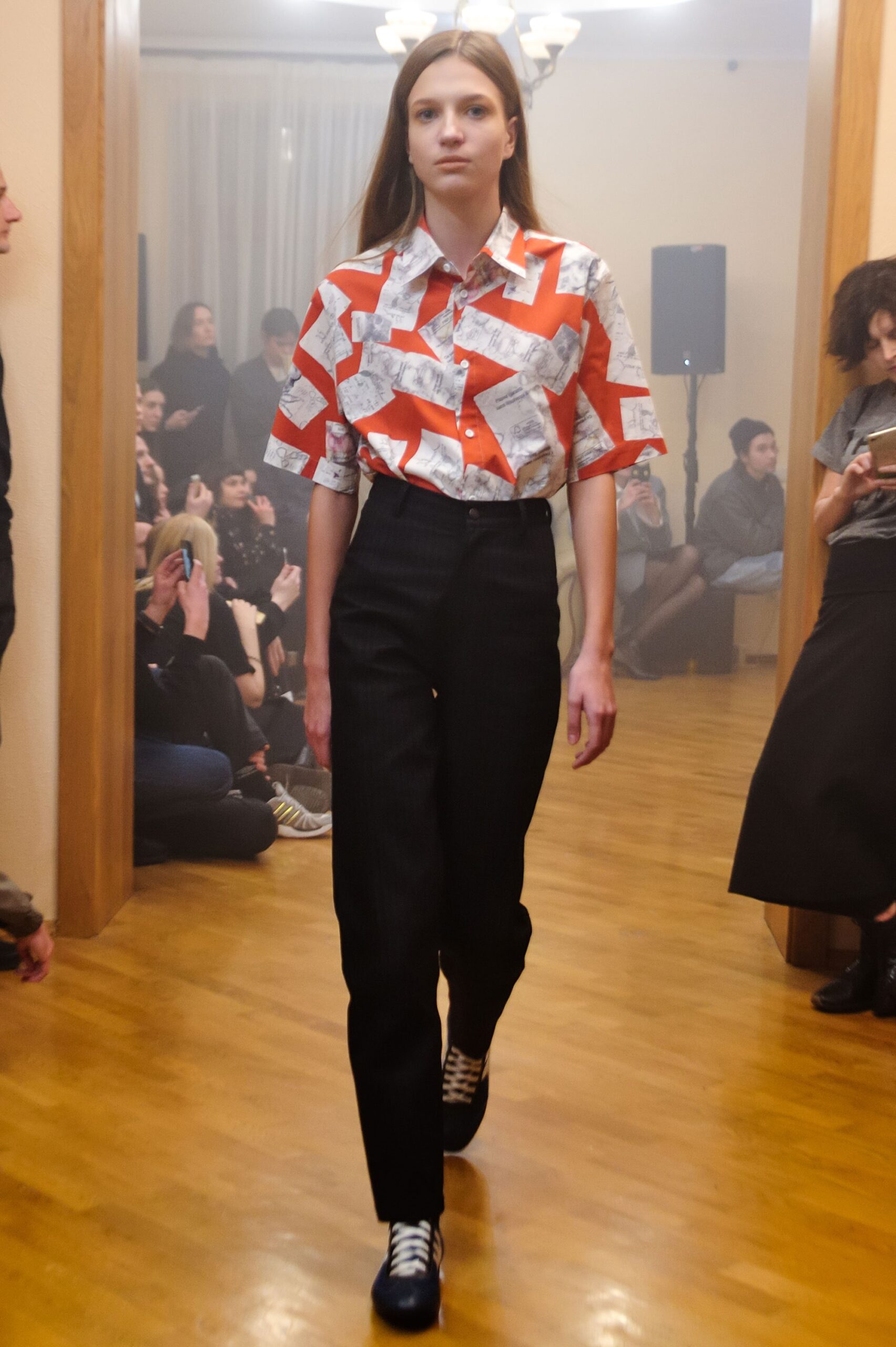 red and white printed shirt with black tailored pants