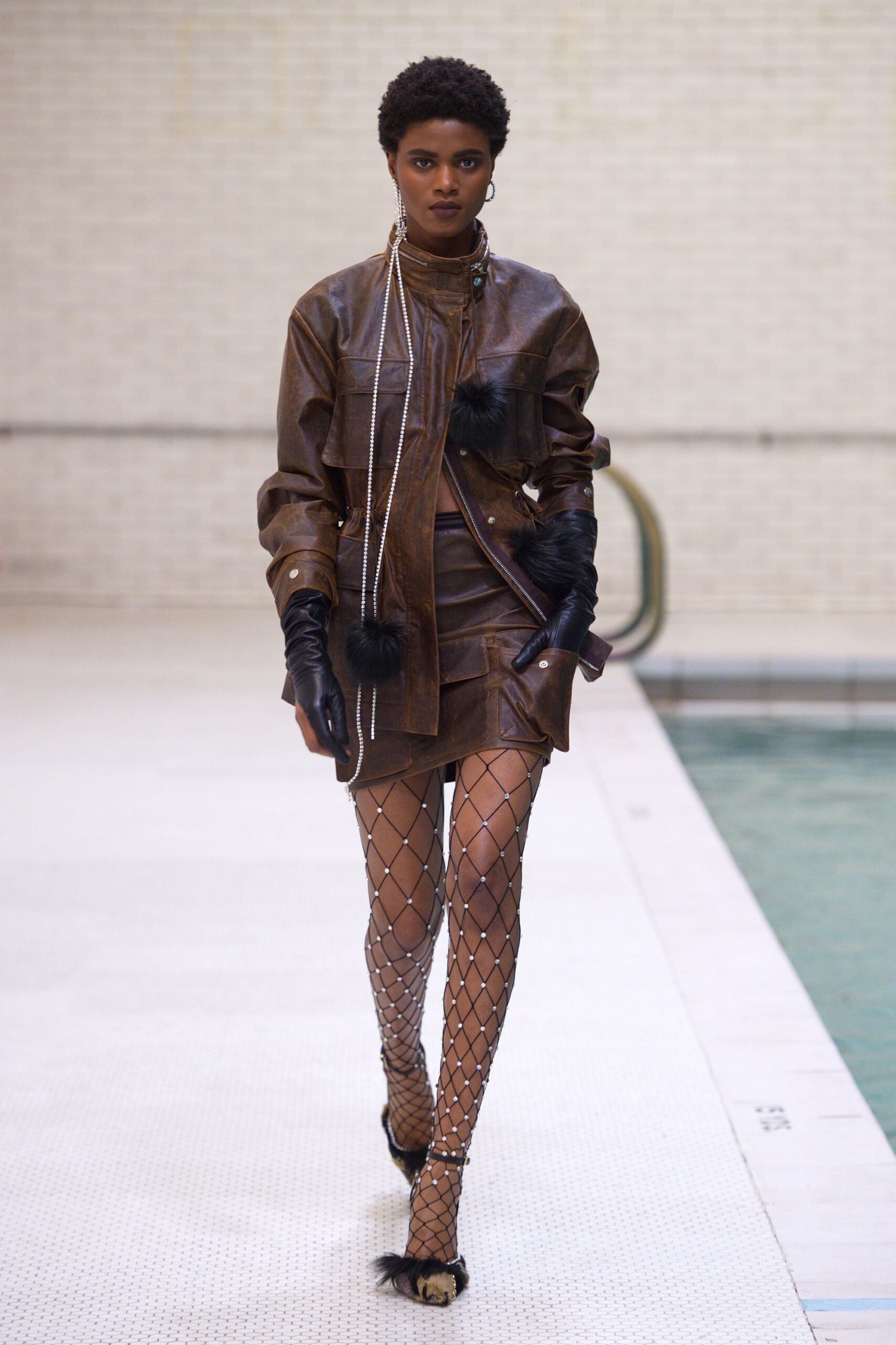 brown leather fitted jacket and mini skirt