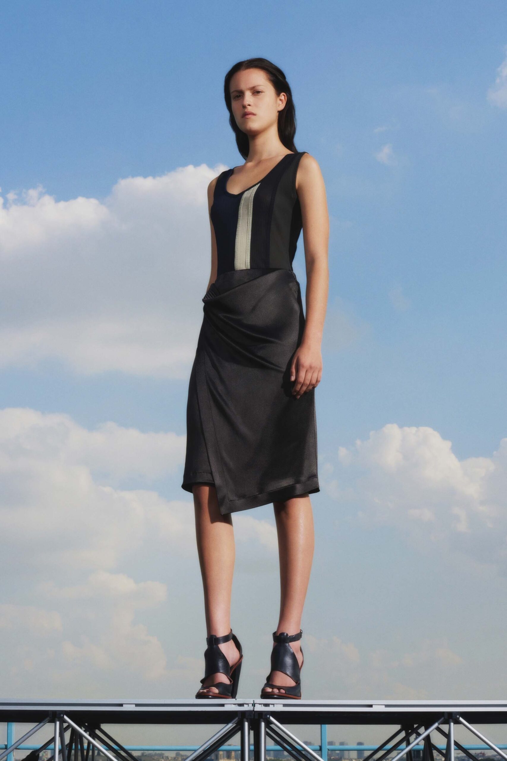 fitted black silk sleeveless dress
