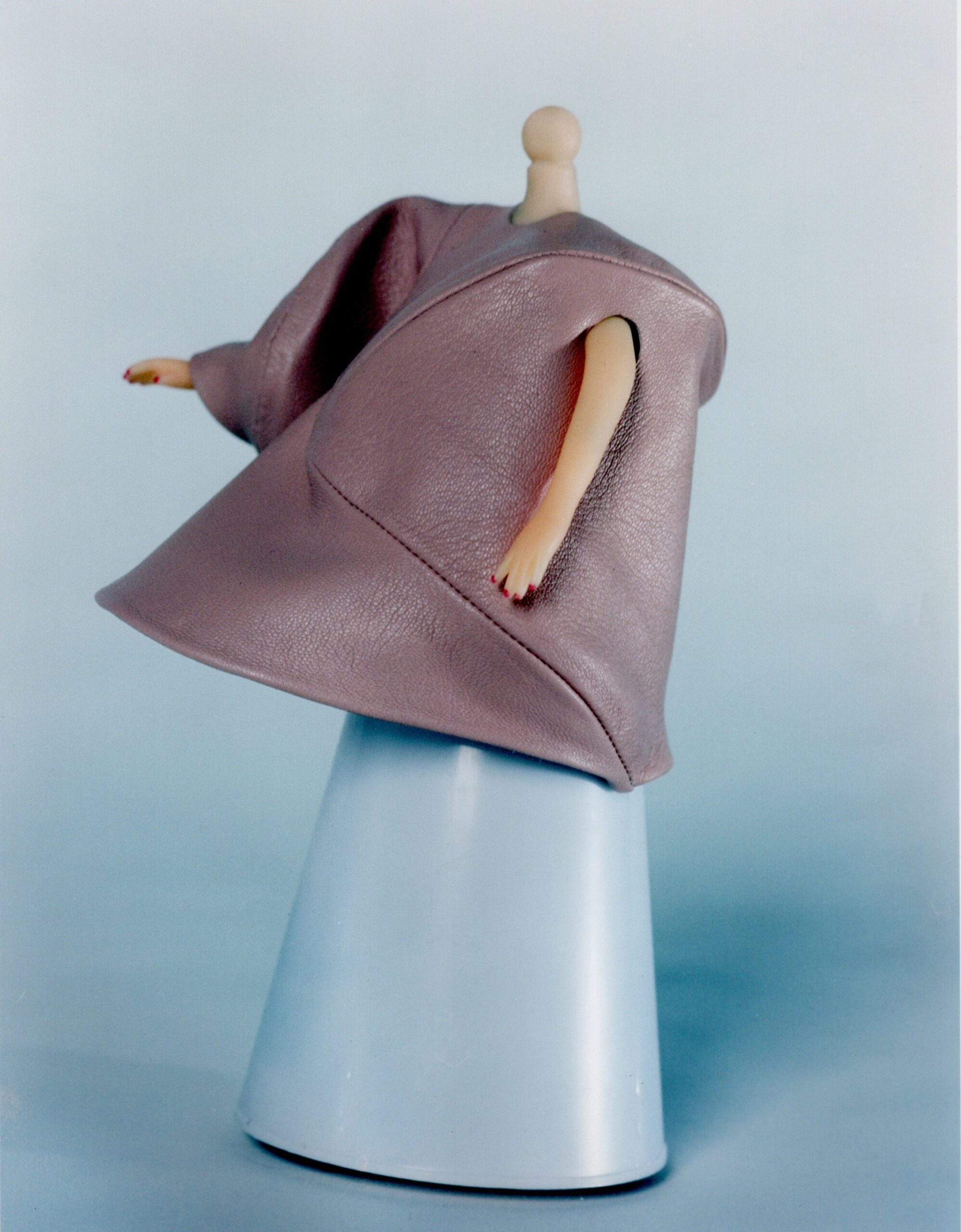 pink leather oversized coat with white skirt