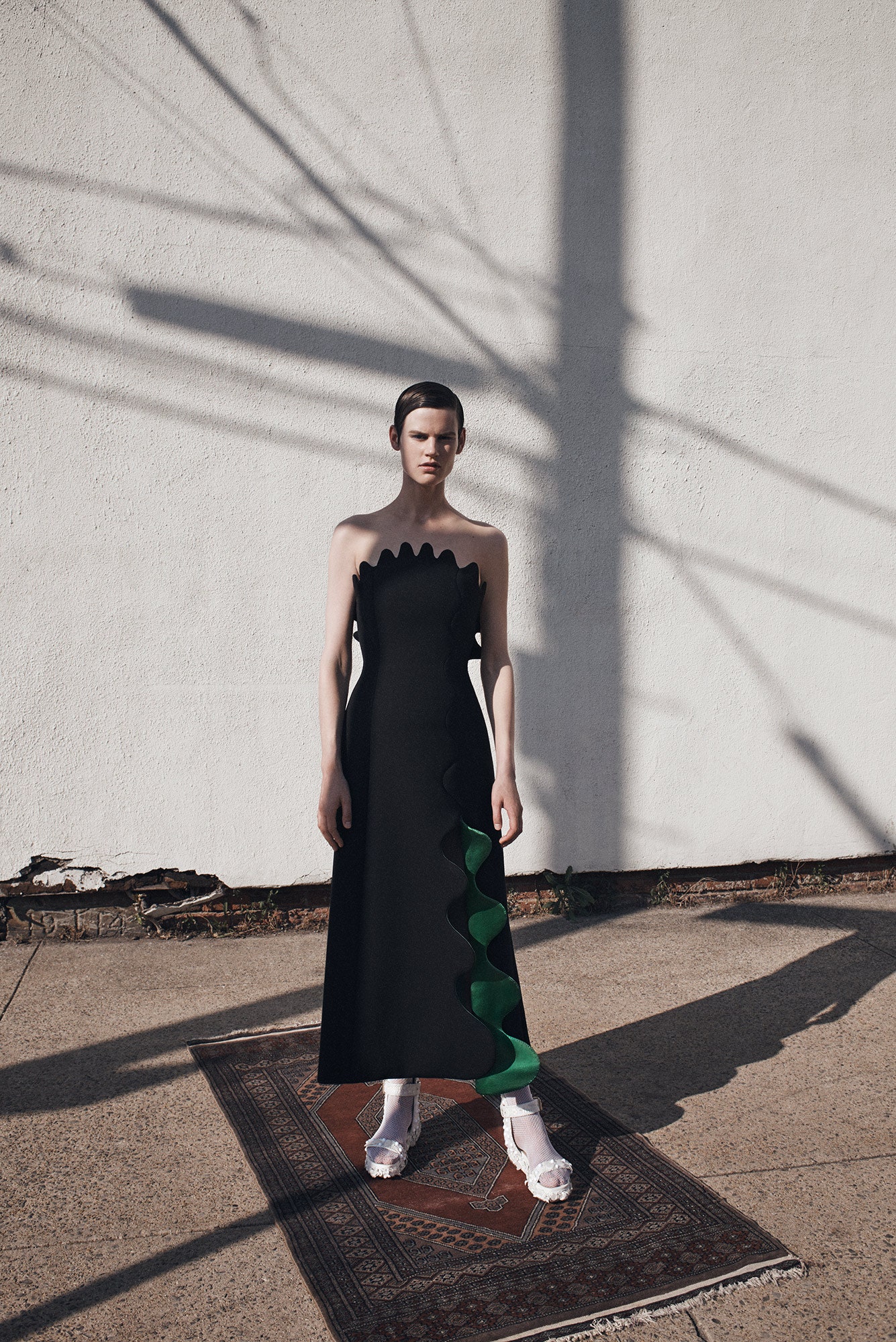 black cotton strapless fitted draped tiered maxi gown