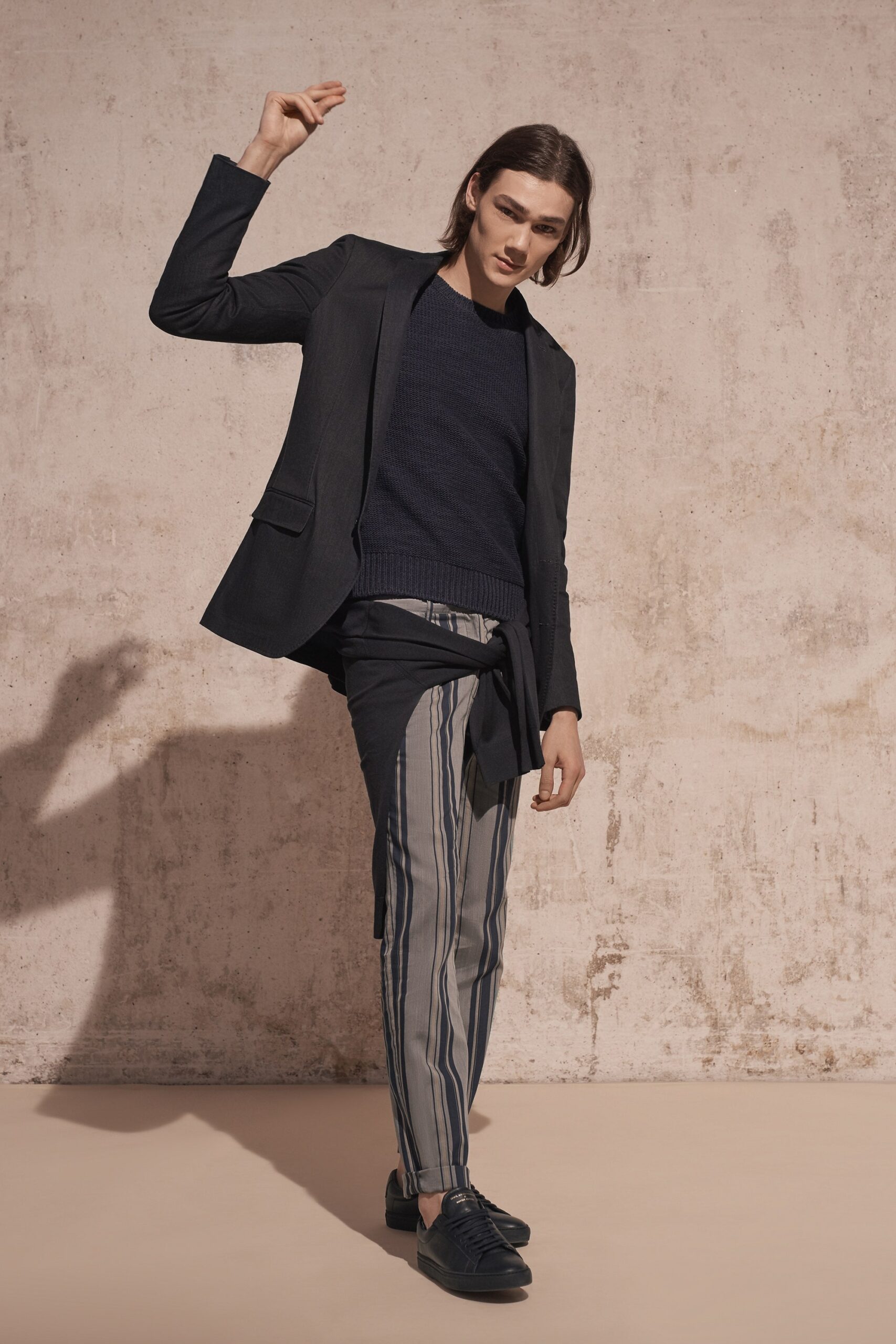 black tailored blazer with navy sweater
