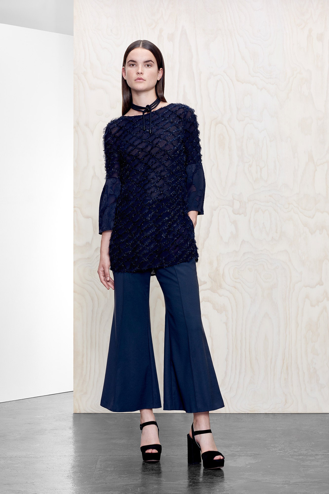 blue relaxed top with flared pants