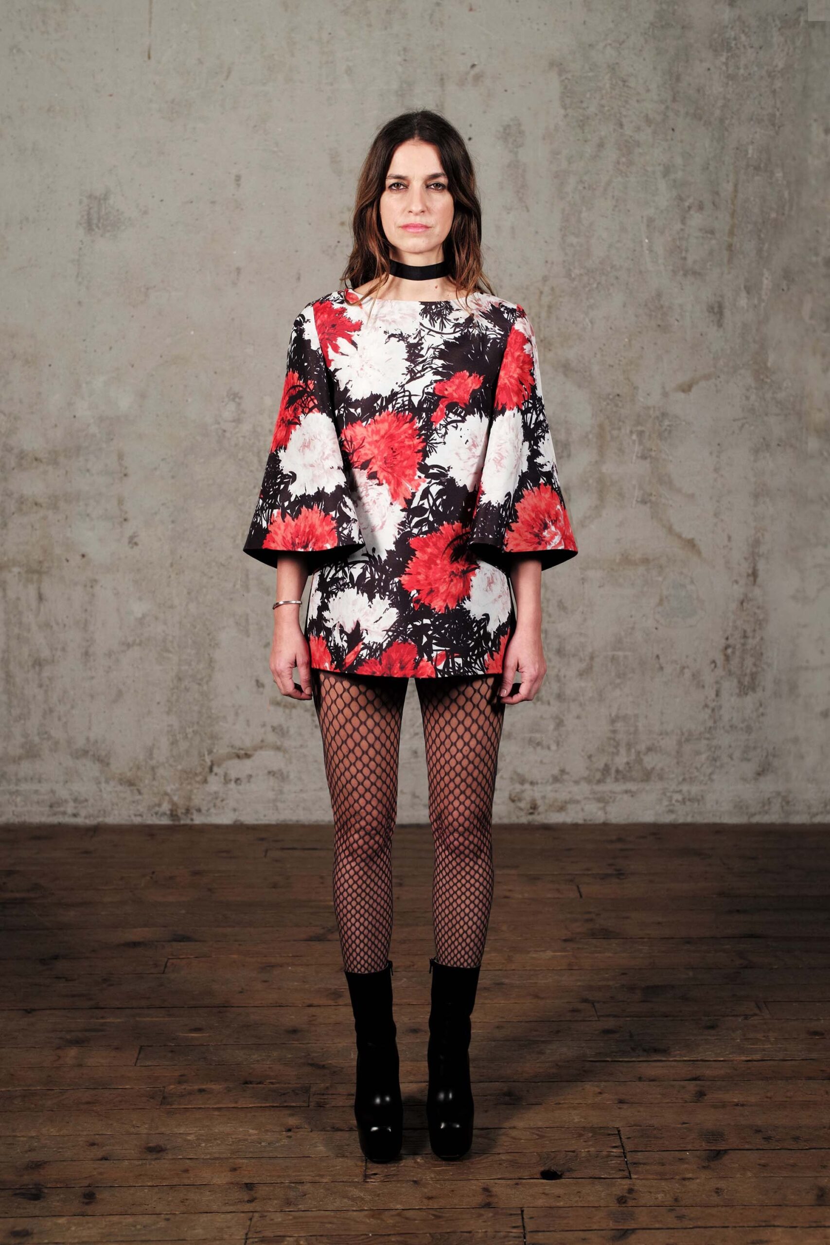 black cotton short-sleeve high-neck fitted flared short top