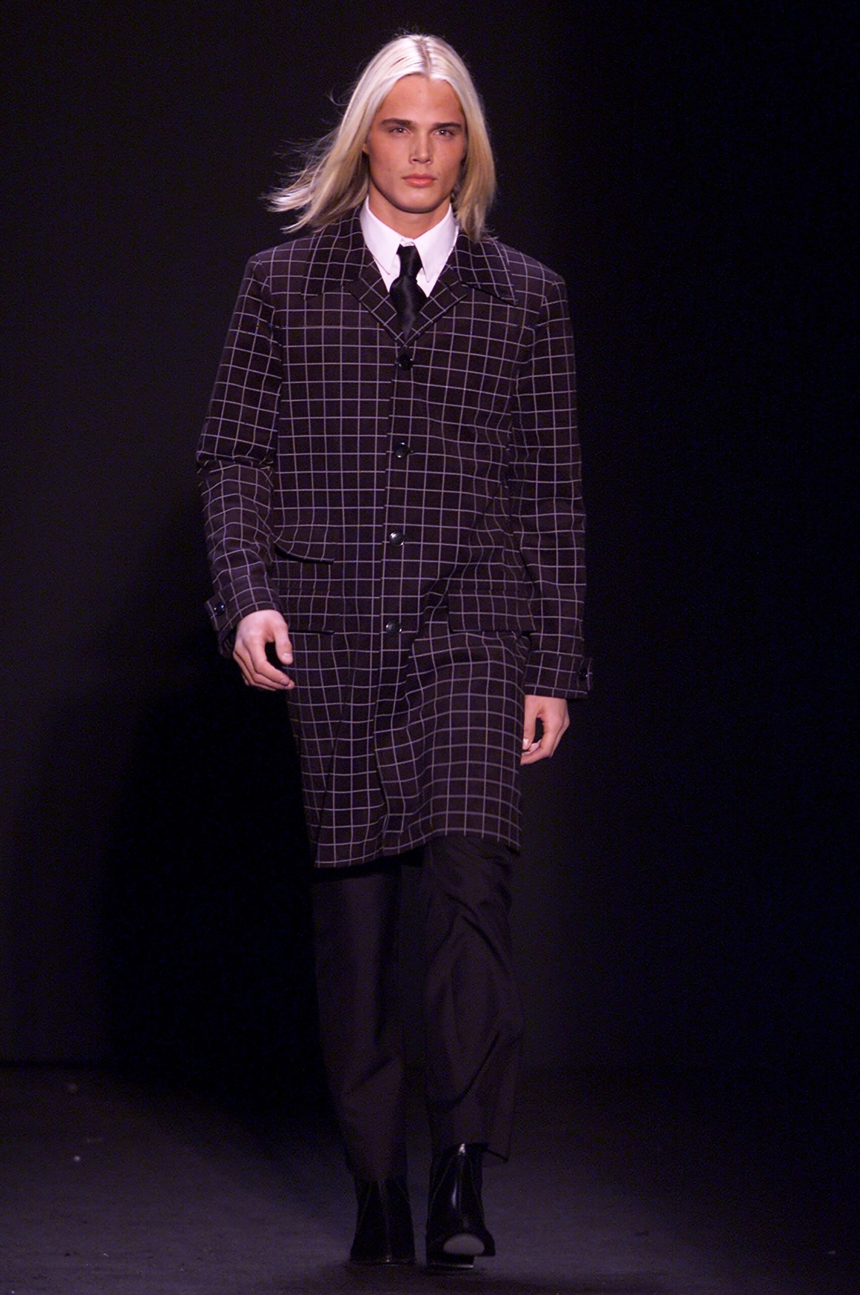 checked black and white coat with slim pants