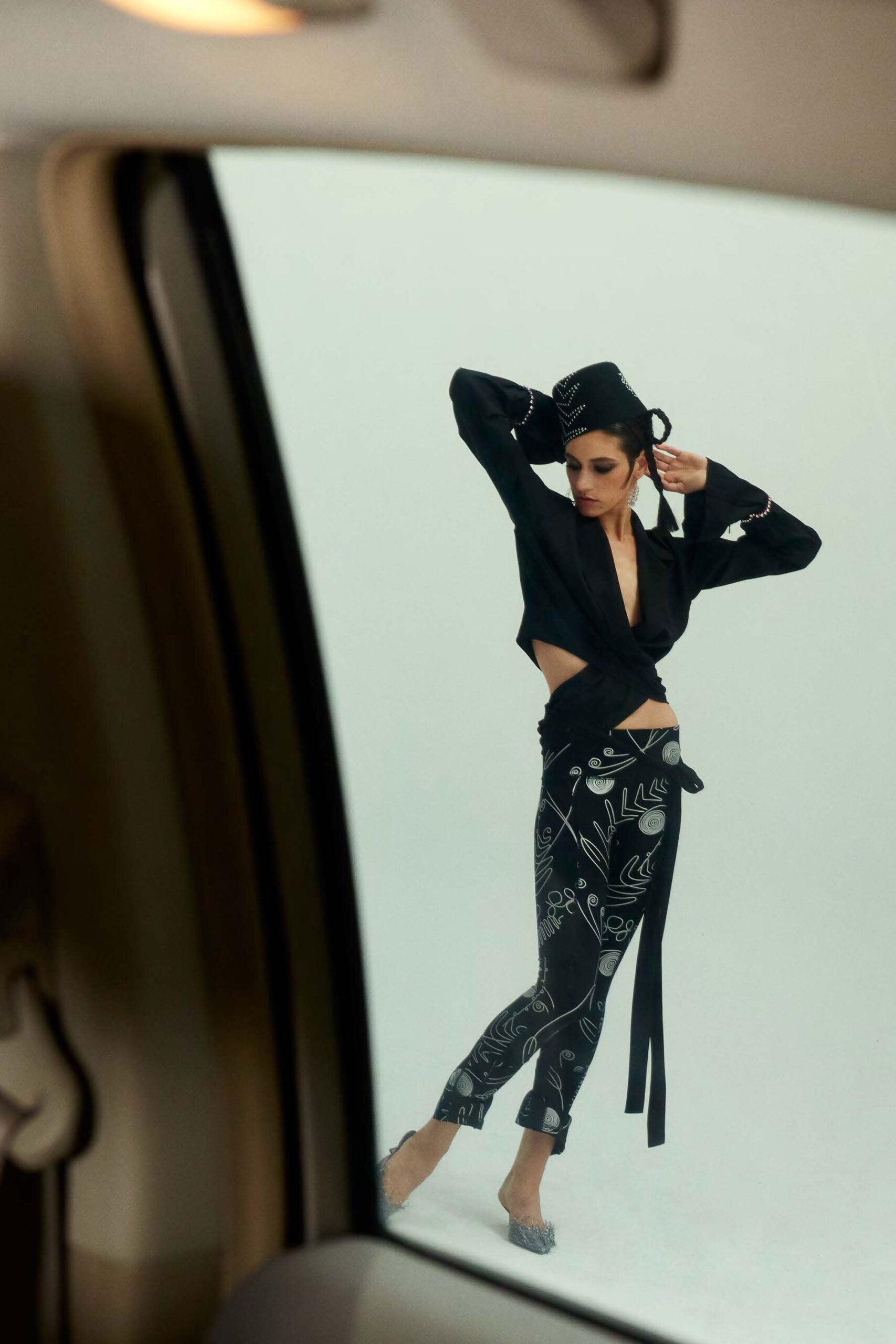 black fitted top and printed pants