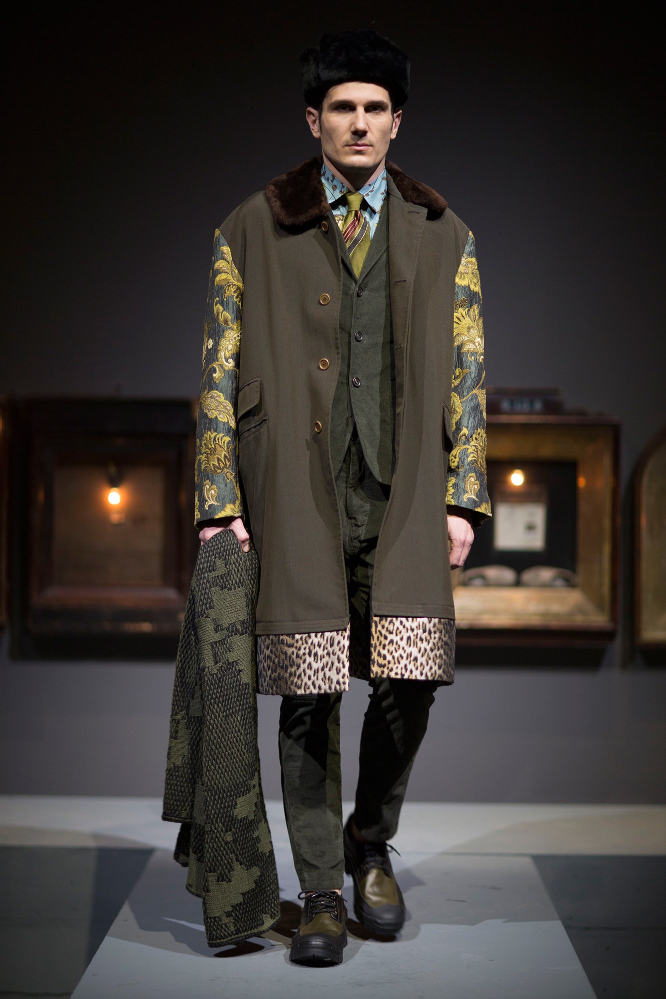 green printed coat with tailored suit