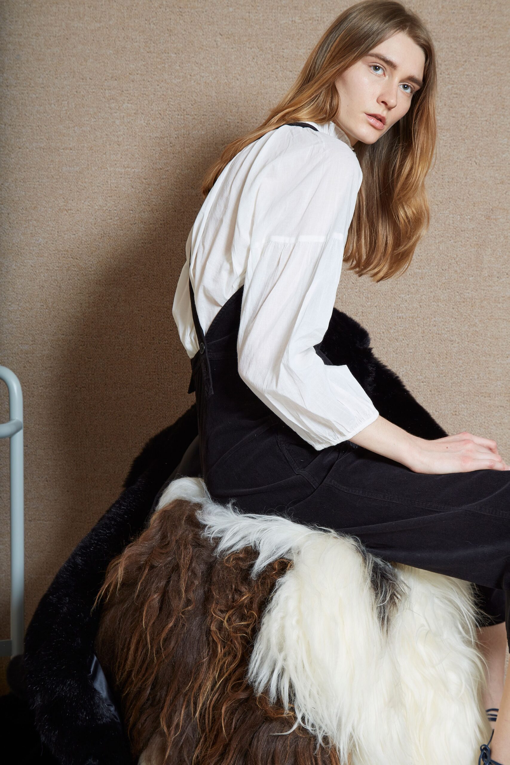 white cotton blouse and black jumpsuit