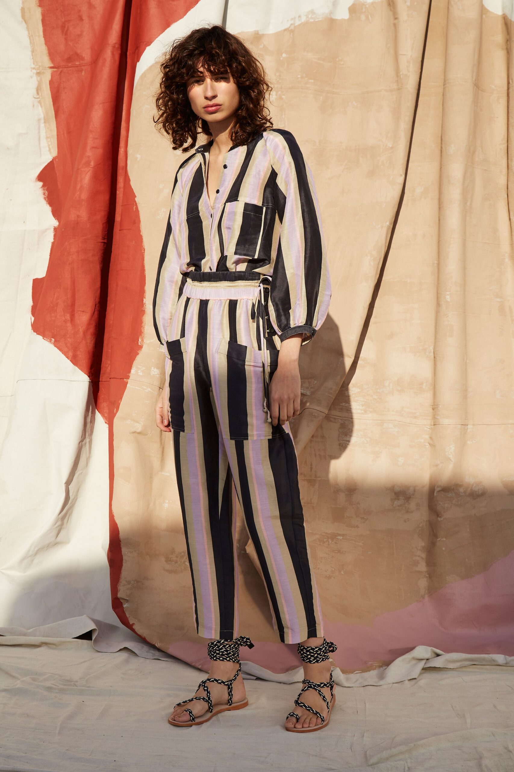 striped relaxed jumpsuit with strappy shoes