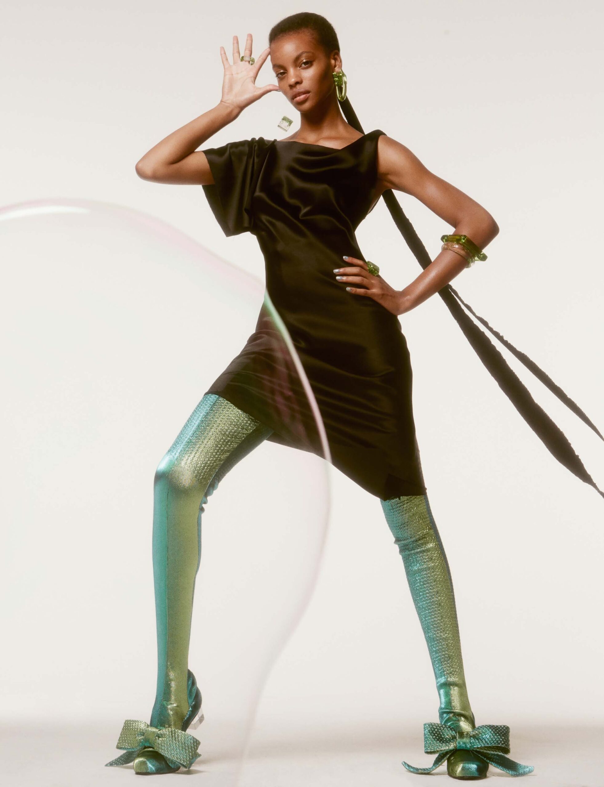 green vinyl fitted straight-leg shiny pants