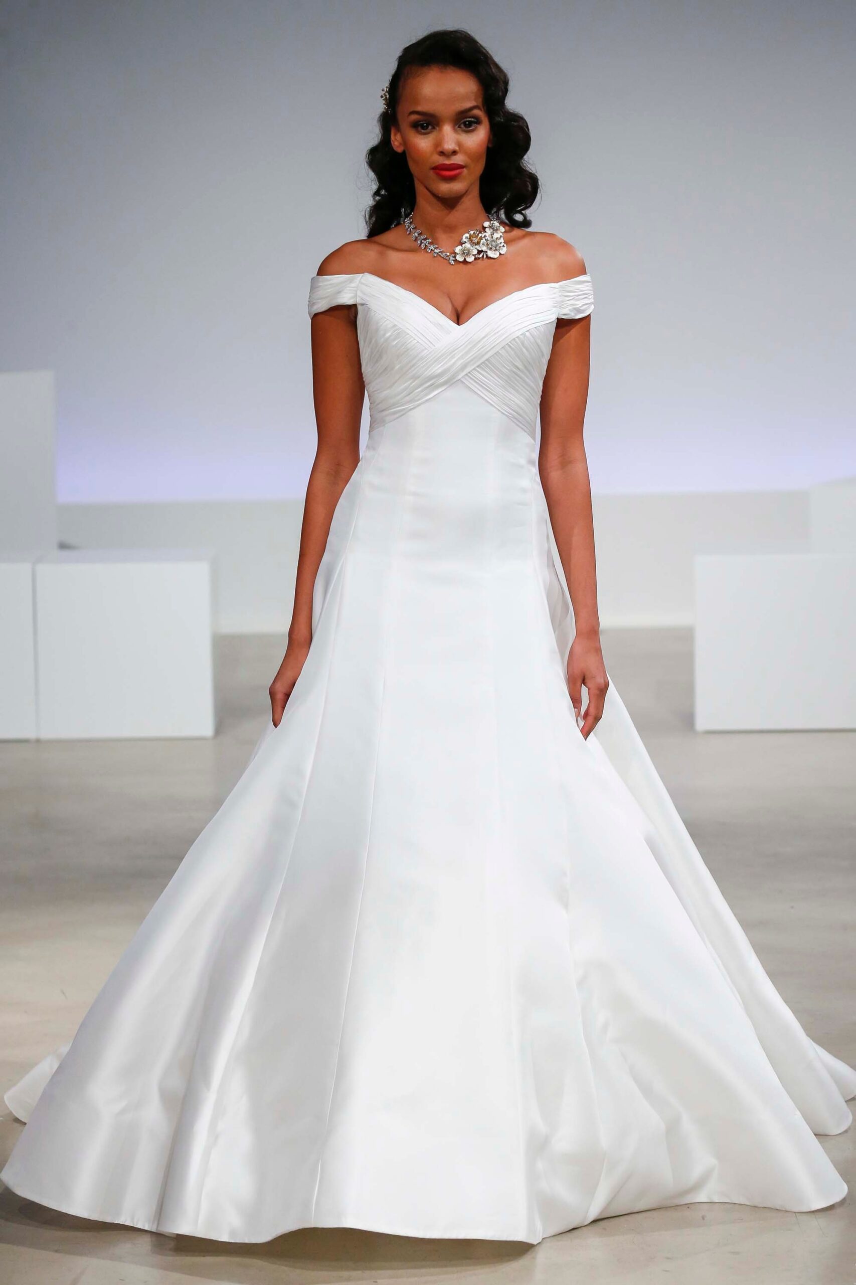 white silk off-shoulder gown