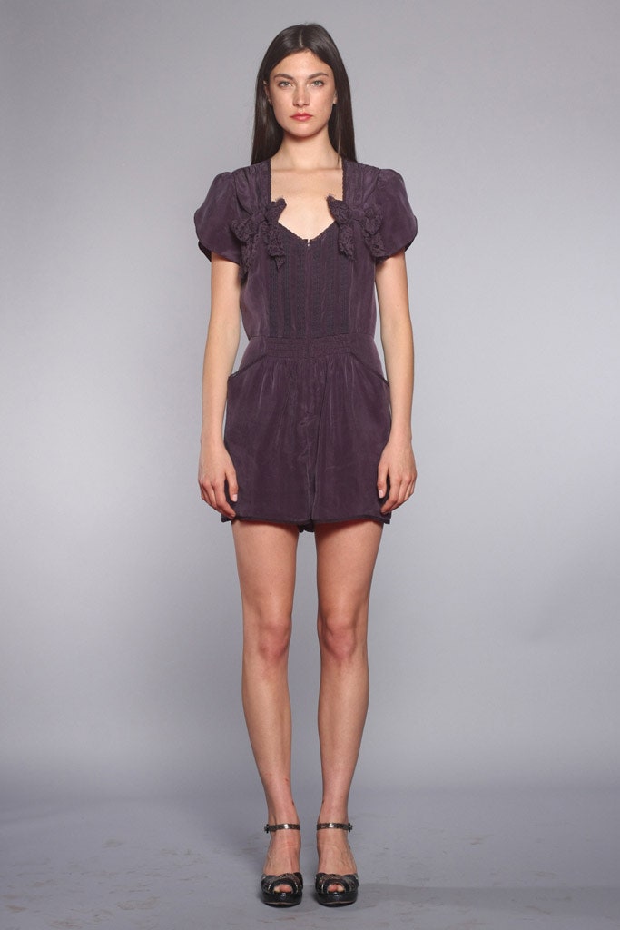 purple fitted ruffled romper