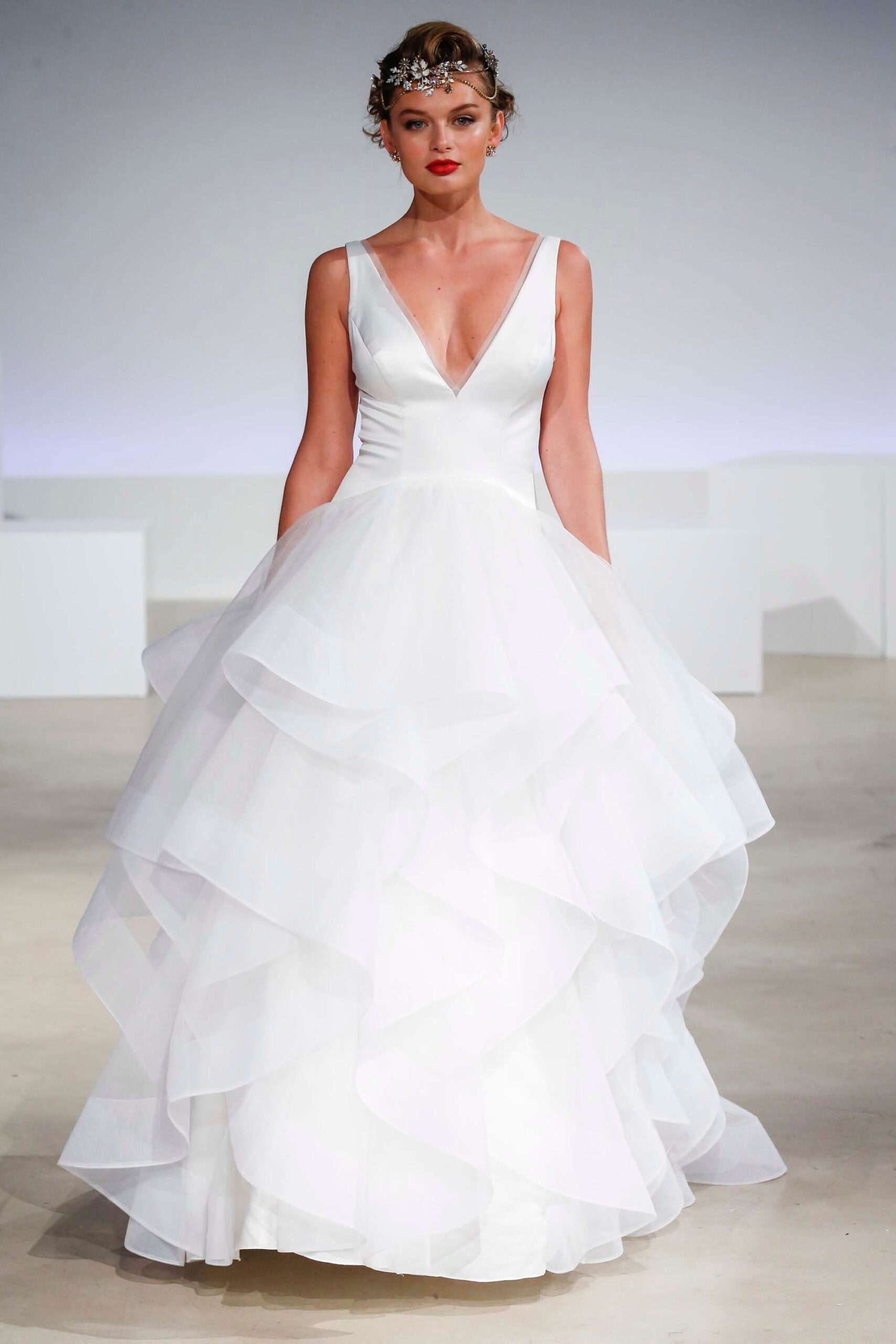 white tiered sleeveless gown