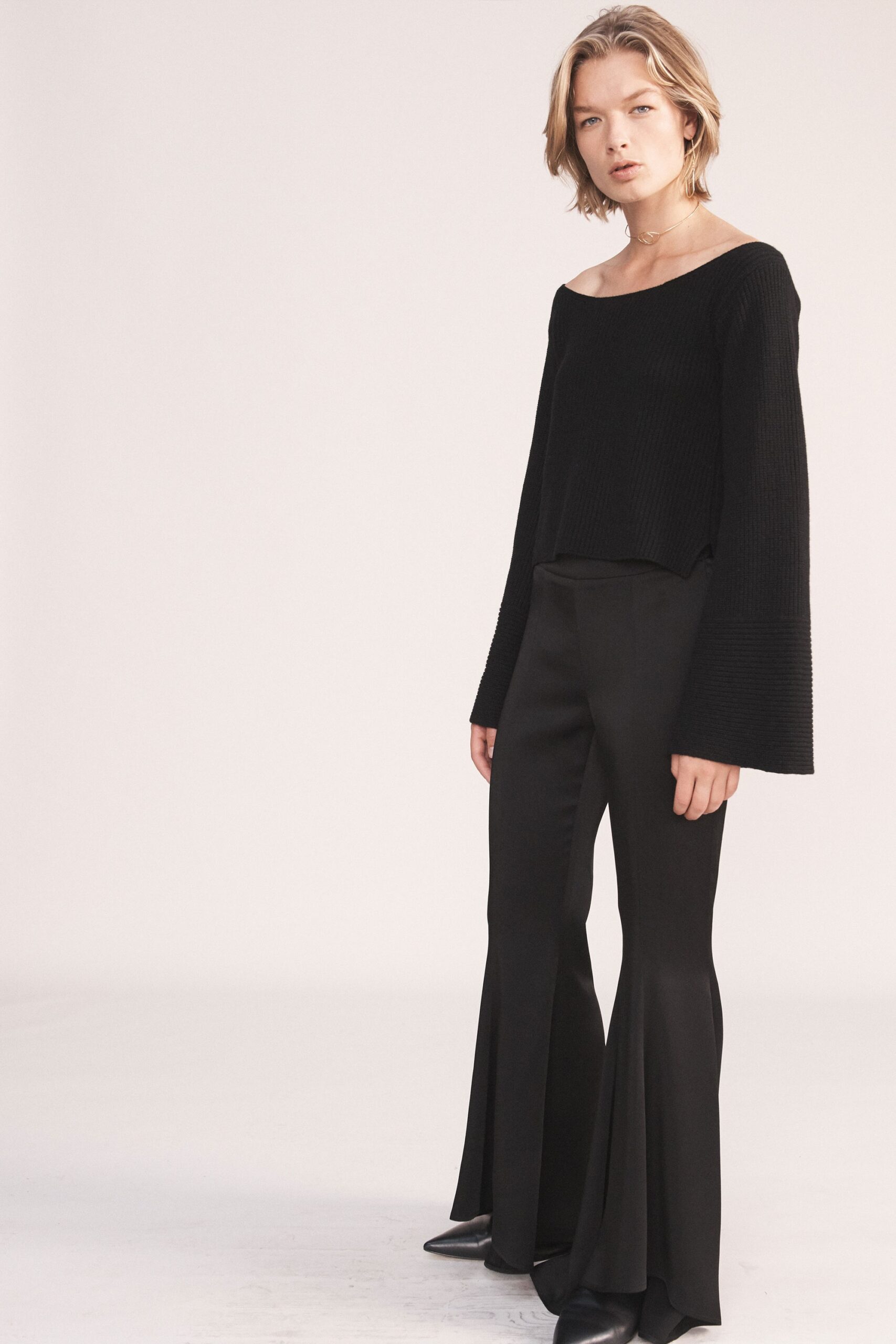 black cotton long-sleeve off-shoulder relaxed flared top