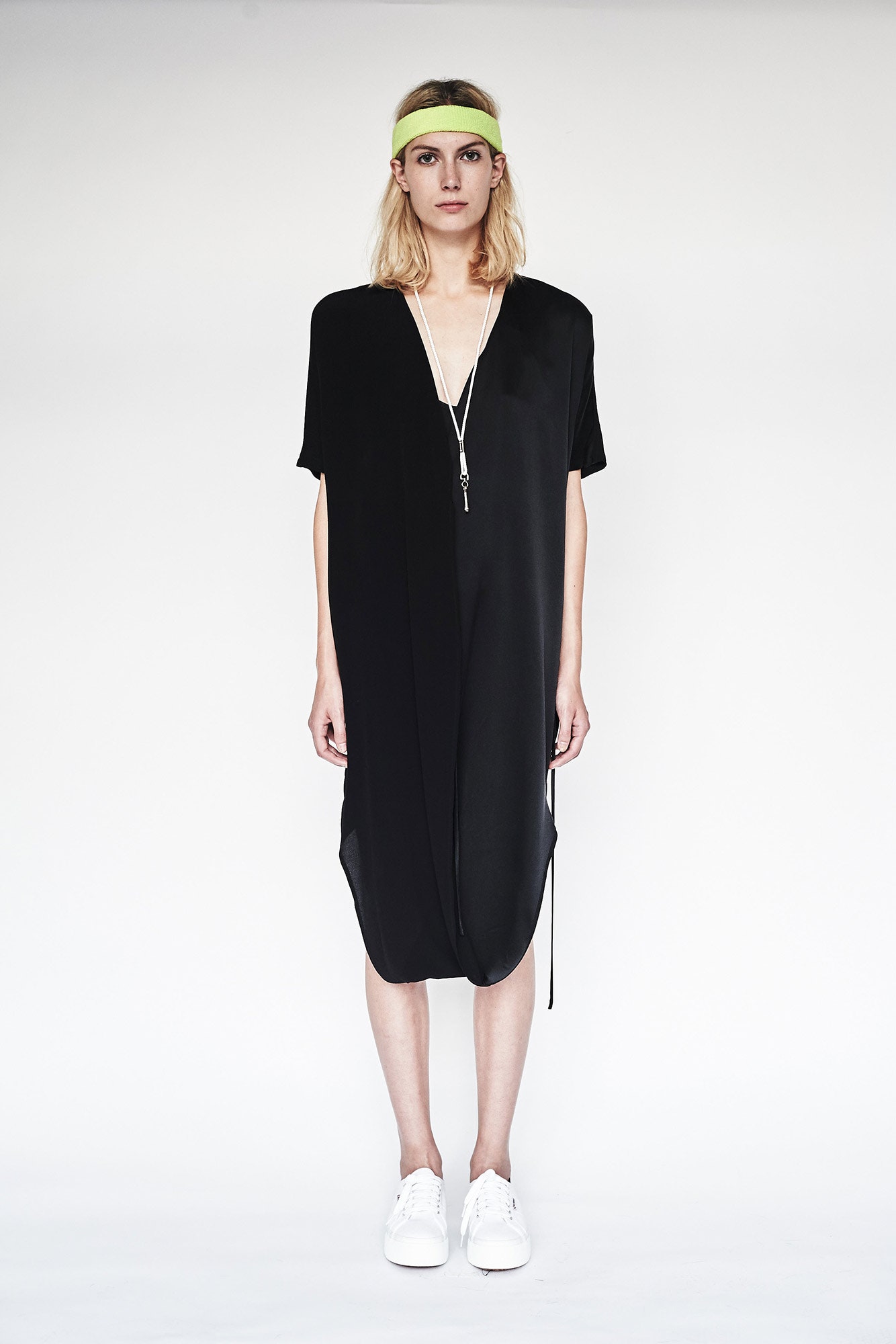 black relaxed midi dress with sneakers