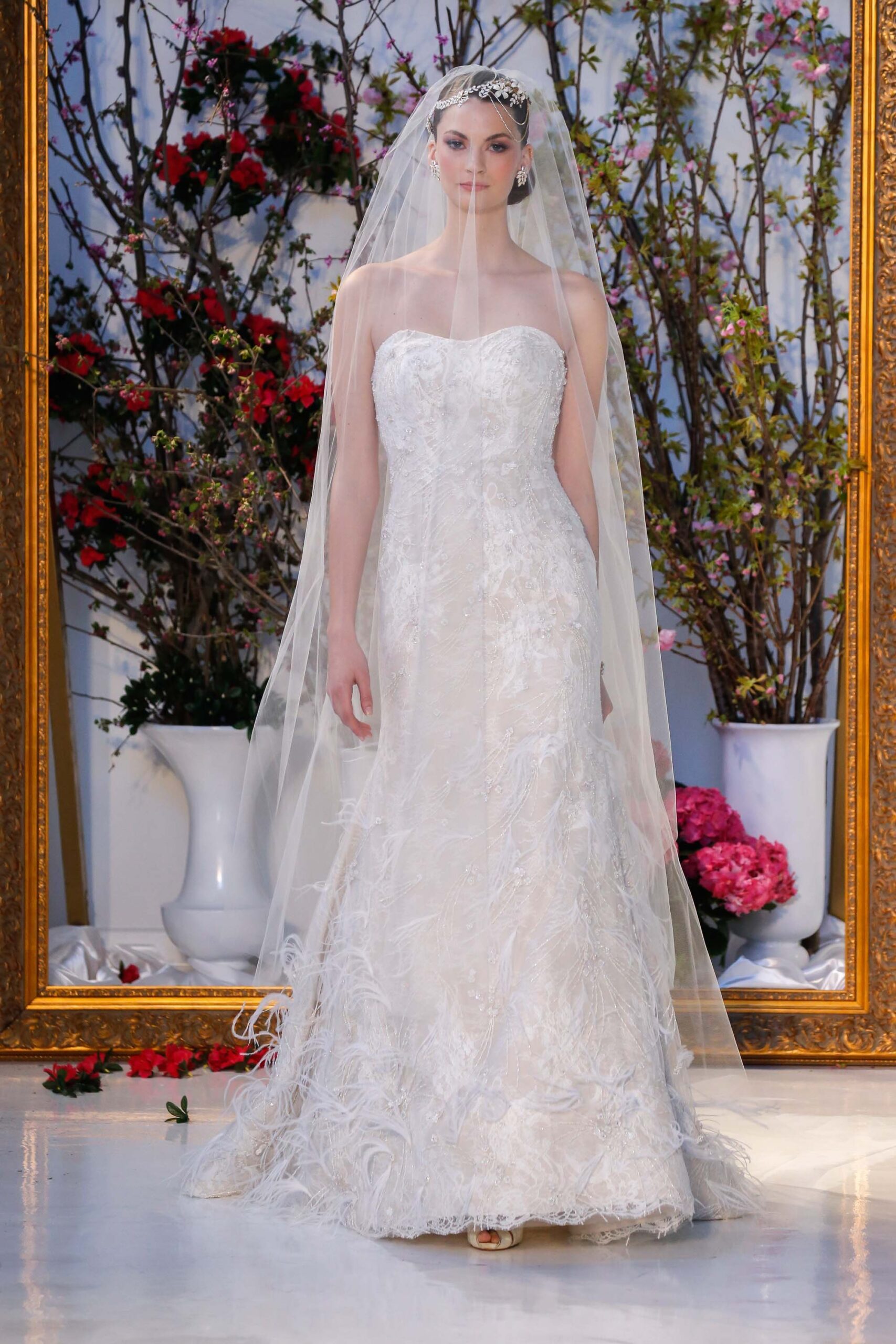 white embroidered strapless gown with veil