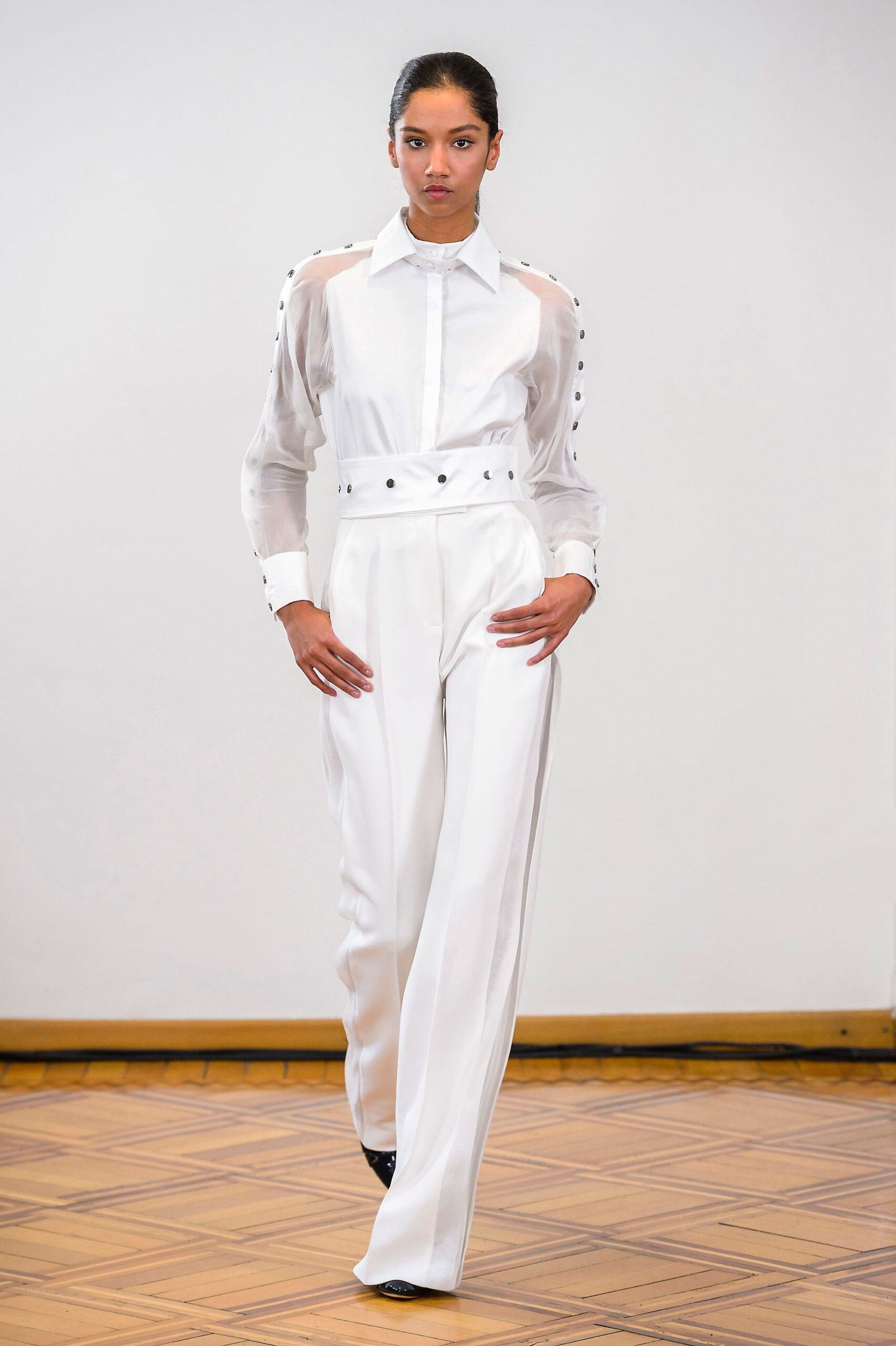 white silk fitted shirt and tailored pants