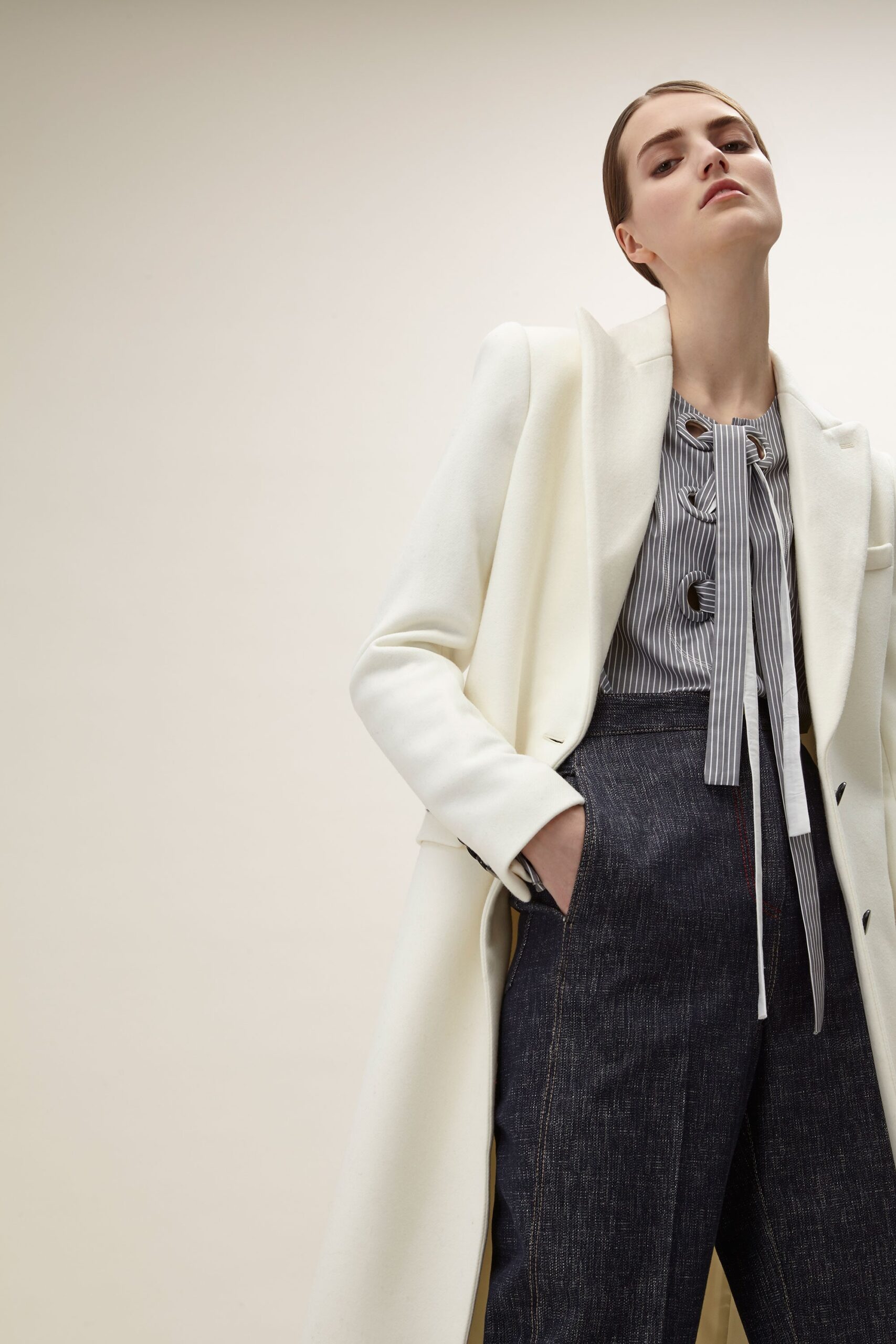 white tailored coat with striped blouse